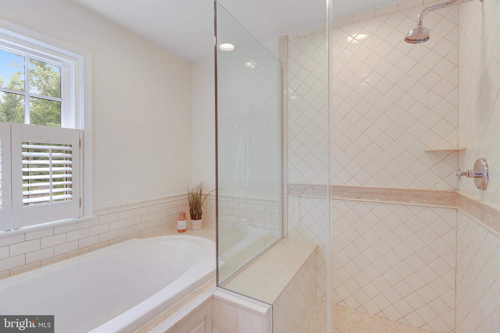 8618 Brook Road McLean, VA 22102 - Photo 49 of 81 Marble shower, flooring, & counters