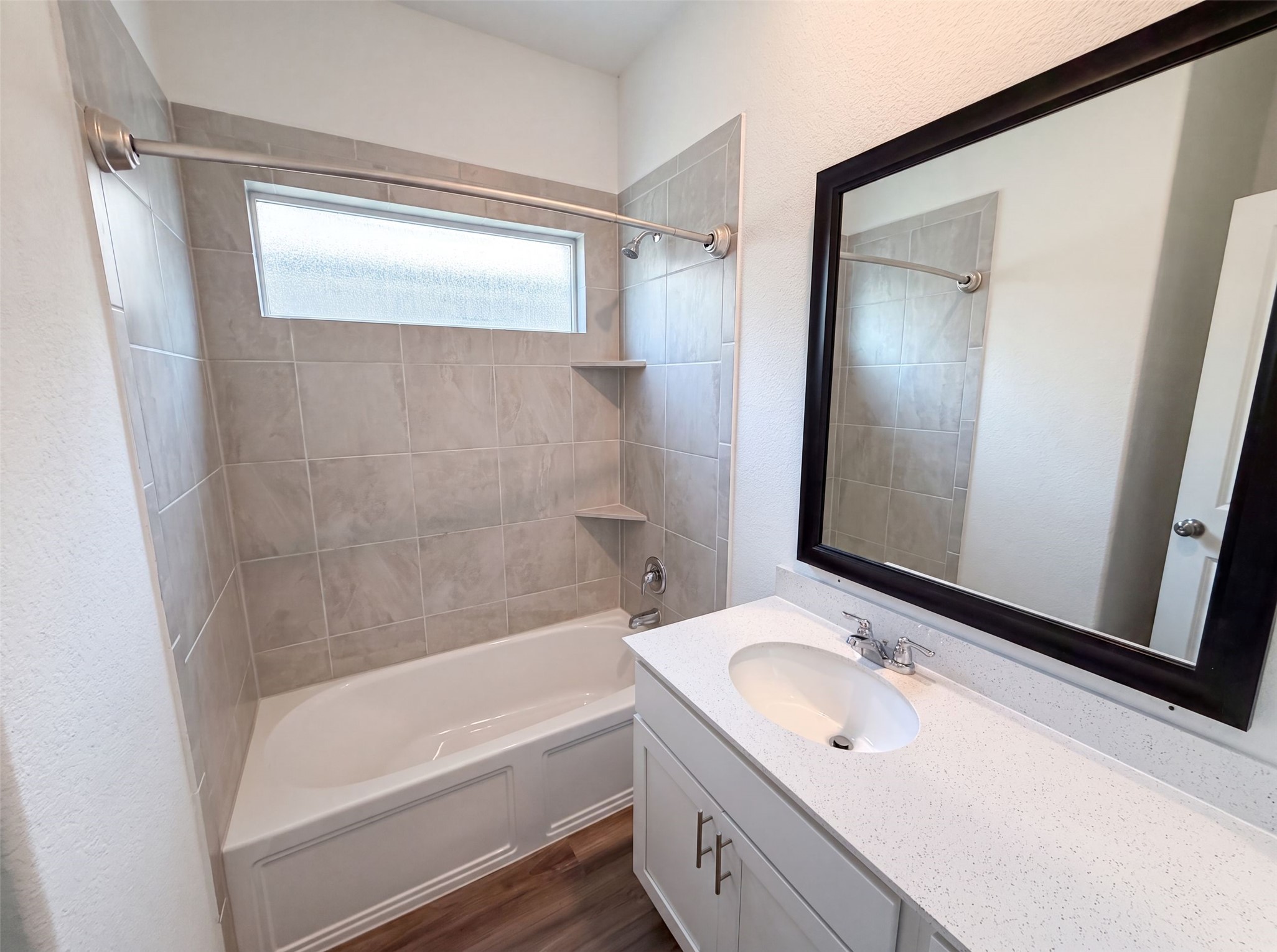 424 Wolf Springs Road Georgetown, TX 78628 - Photo 10 of 15 A well-appointed bathroom with contemporary fixtures and a spacious vanity.