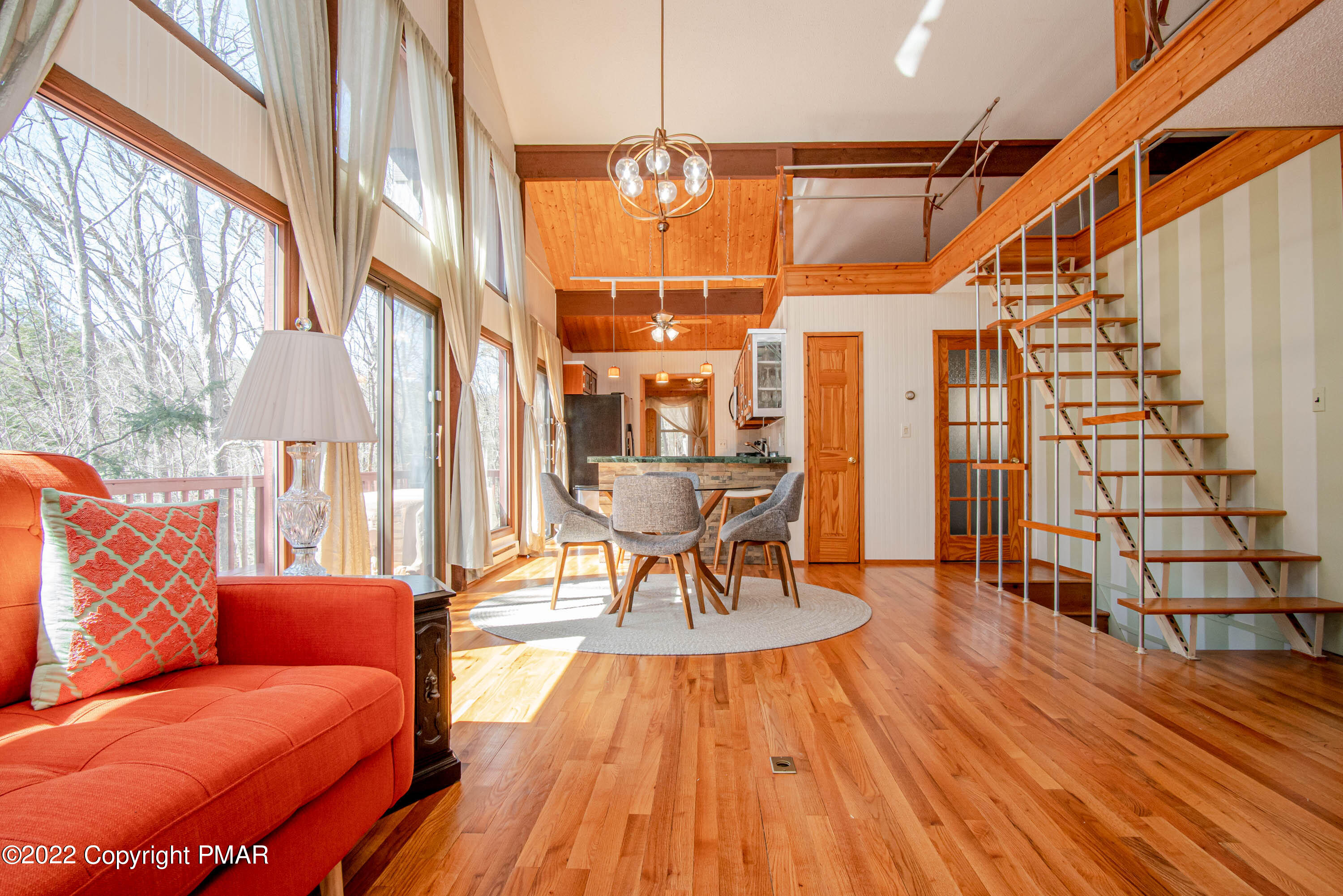 6374 Decker Road Bushkill, PA 18324 - Photo 18 of 60 a living room with furniture and a wooden floor