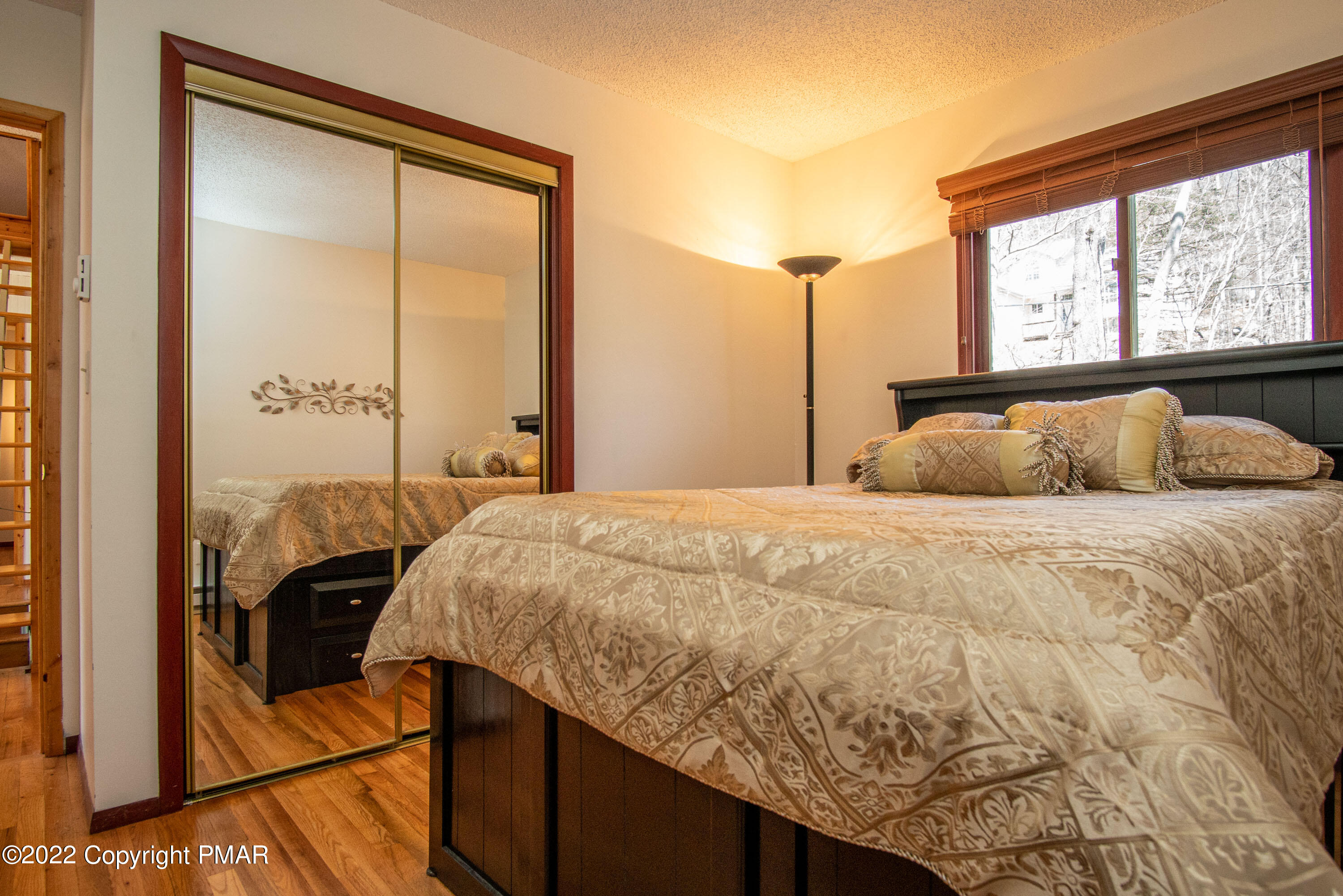 6374 Decker Road Bushkill, PA 18324 - Photo 22 of 60 a bedroom with a bed and window