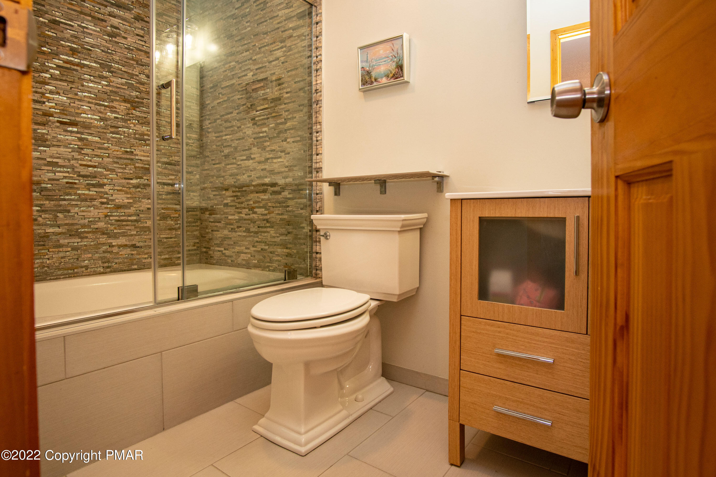 6374 Decker Road Bushkill, PA 18324 - Photo 28 of 60 a bathroom with a toilet and a shower