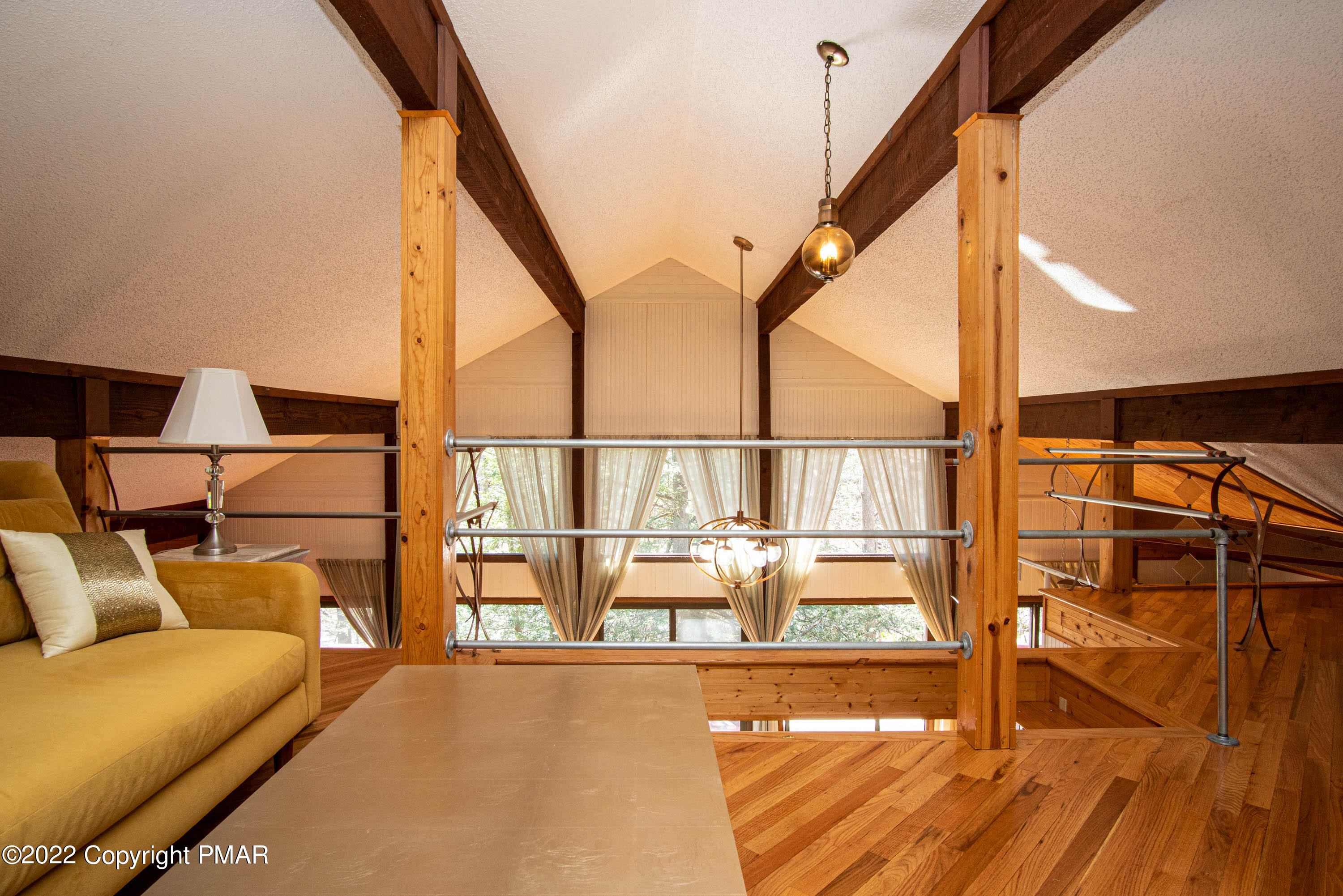 6374 Decker Road Bushkill, PA 18324 - Photo 31 of 60 a view of living room with furniture and floor to ceiling window