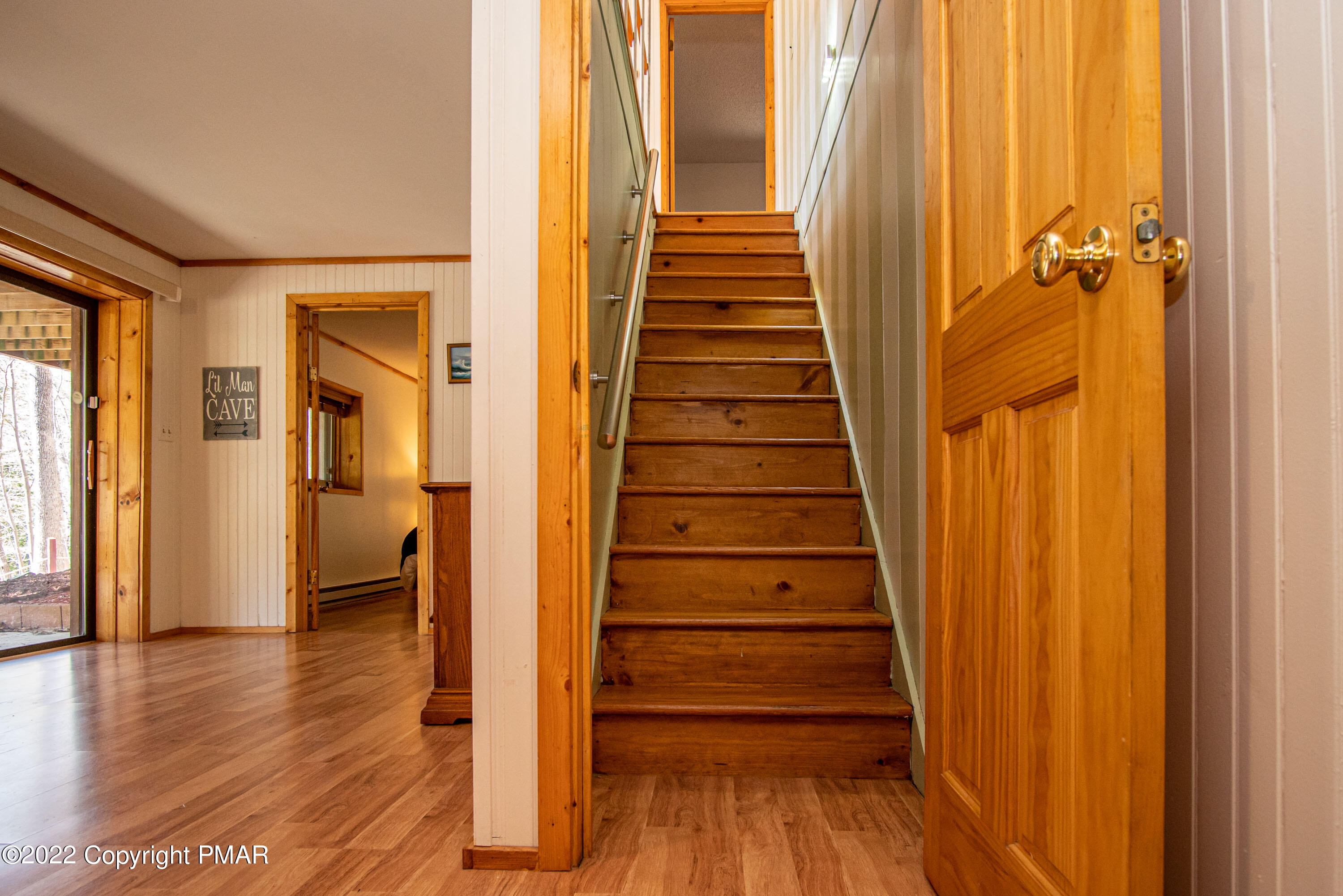 6374 Decker Road Bushkill, PA 18324 - Photo 35 of 60 a view of a hallway with wooden floor and staircase