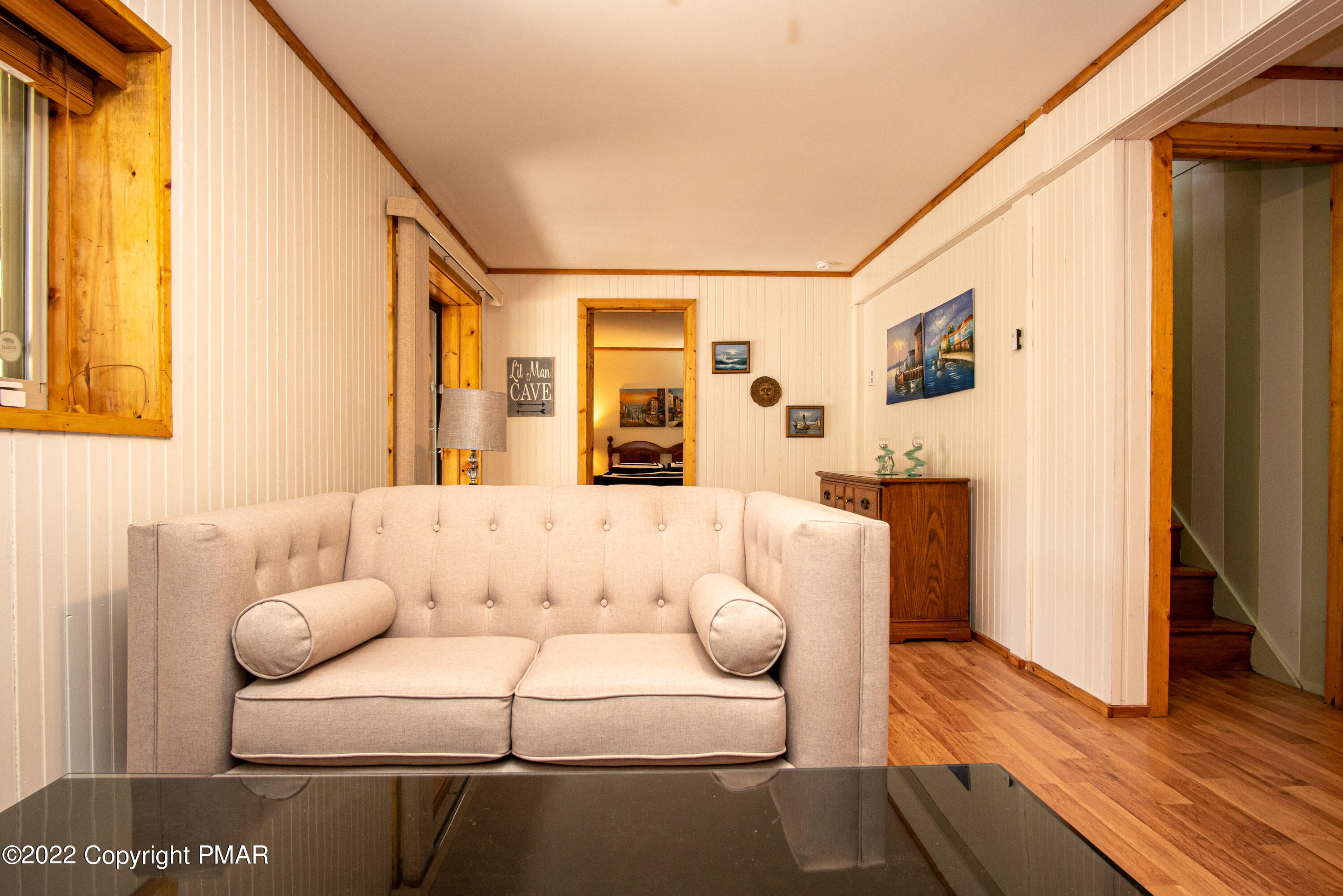 6374 Decker Road Bushkill, PA 18324 - Photo 37 of 60 a living room with furniture and wooden floor