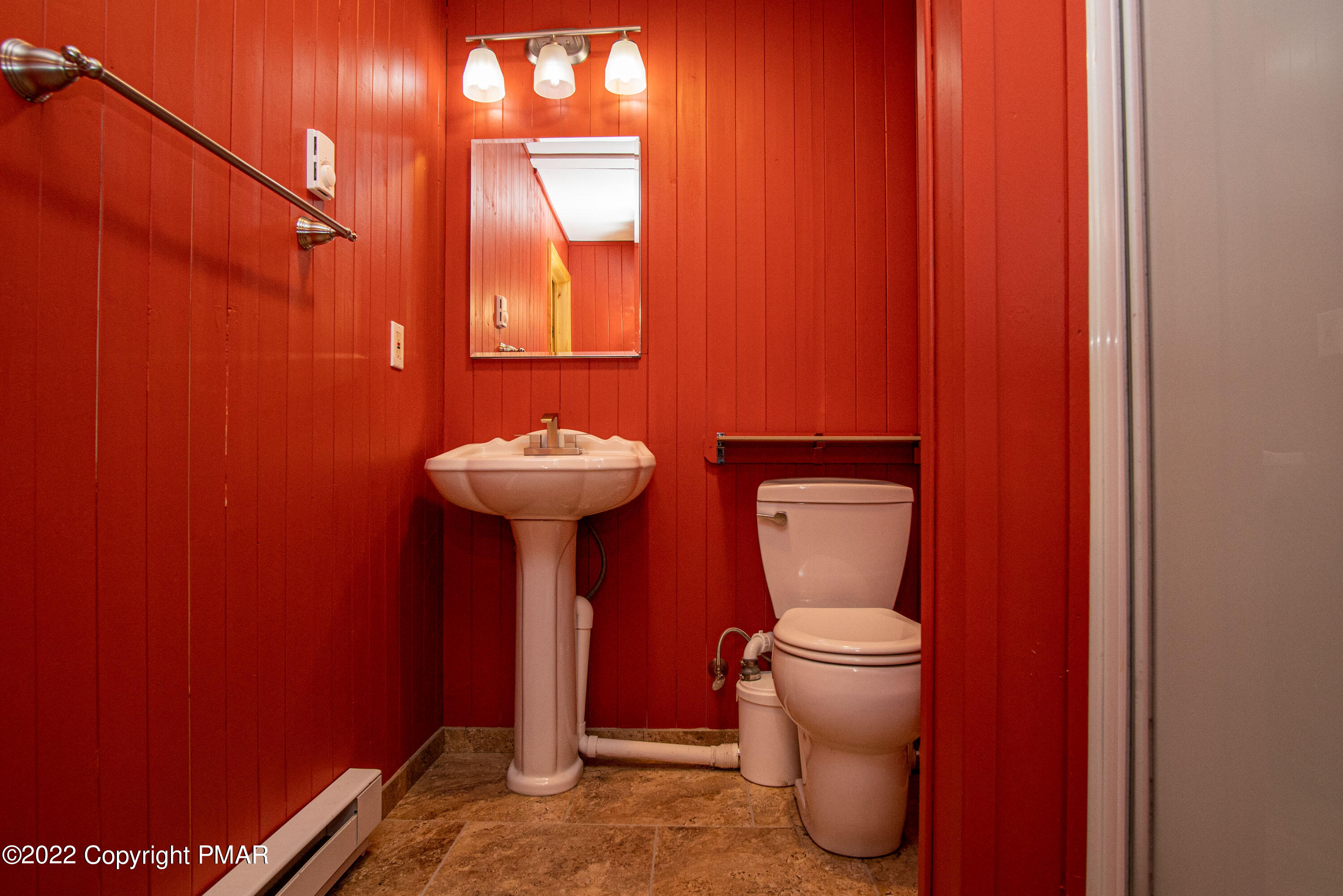 6374 Decker Road Bushkill, PA 18324 - Photo 39 of 60 a bathroom with a toilet and a sink