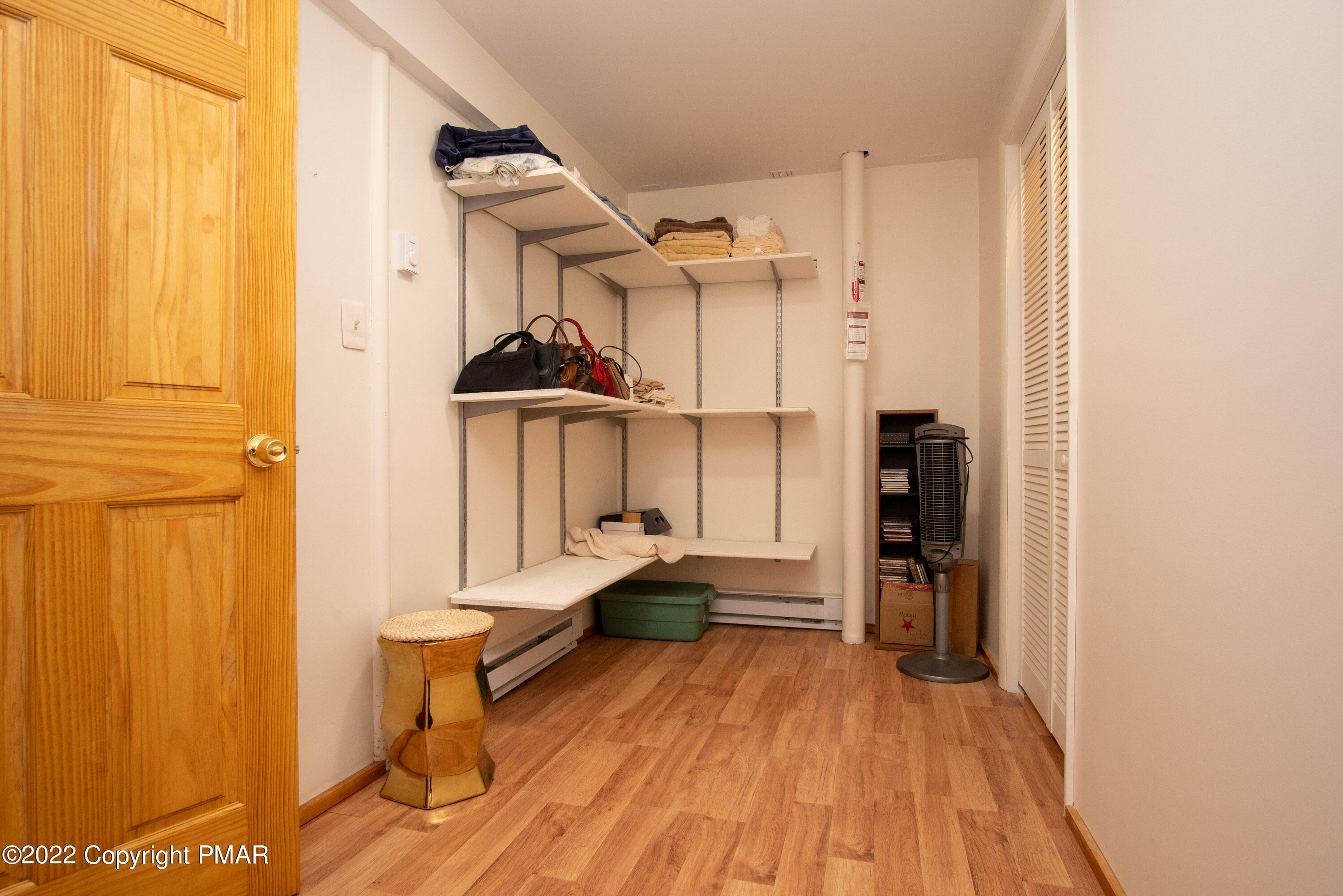 6374 Decker Road Bushkill, PA 18324 - Photo 46 of 60 a view of hallway with wooden floor and furniture