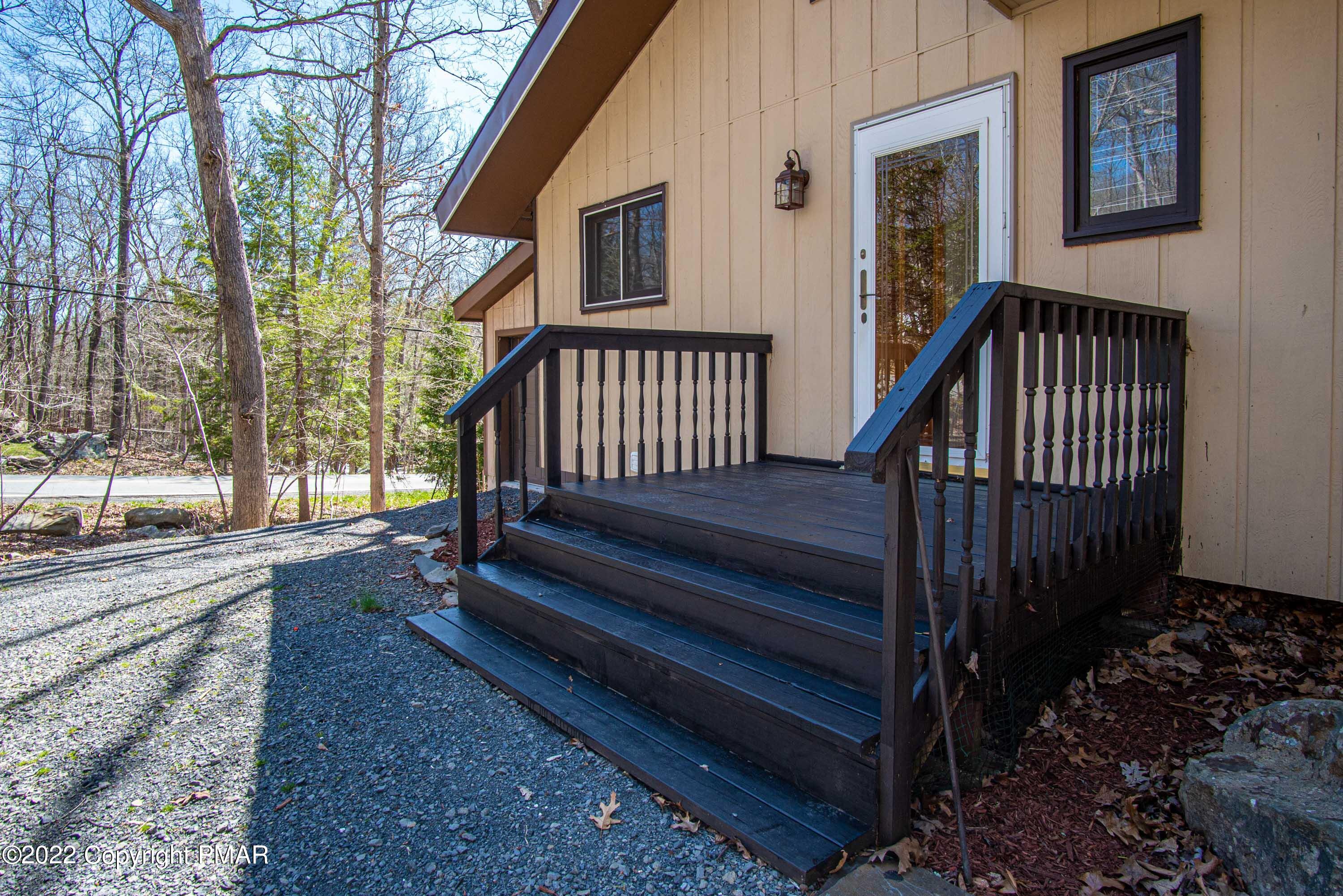 6374 Decker Road Bushkill, PA 18324 - Photo 5 of 60 a view of a house with a yard