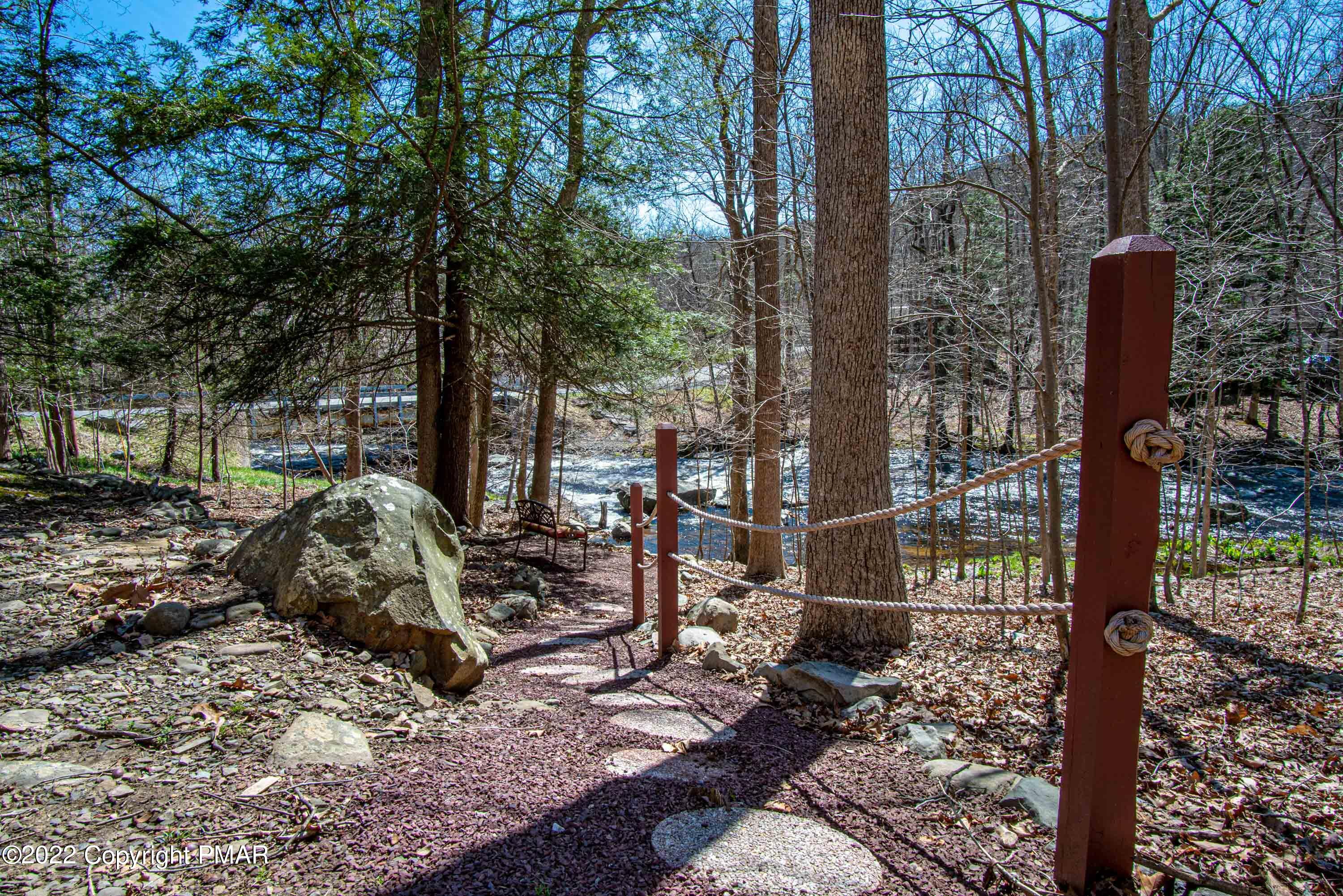 6374 Decker Road Bushkill, PA 18324 - Photo 55 of 60 a backyard of a house with lots of green space