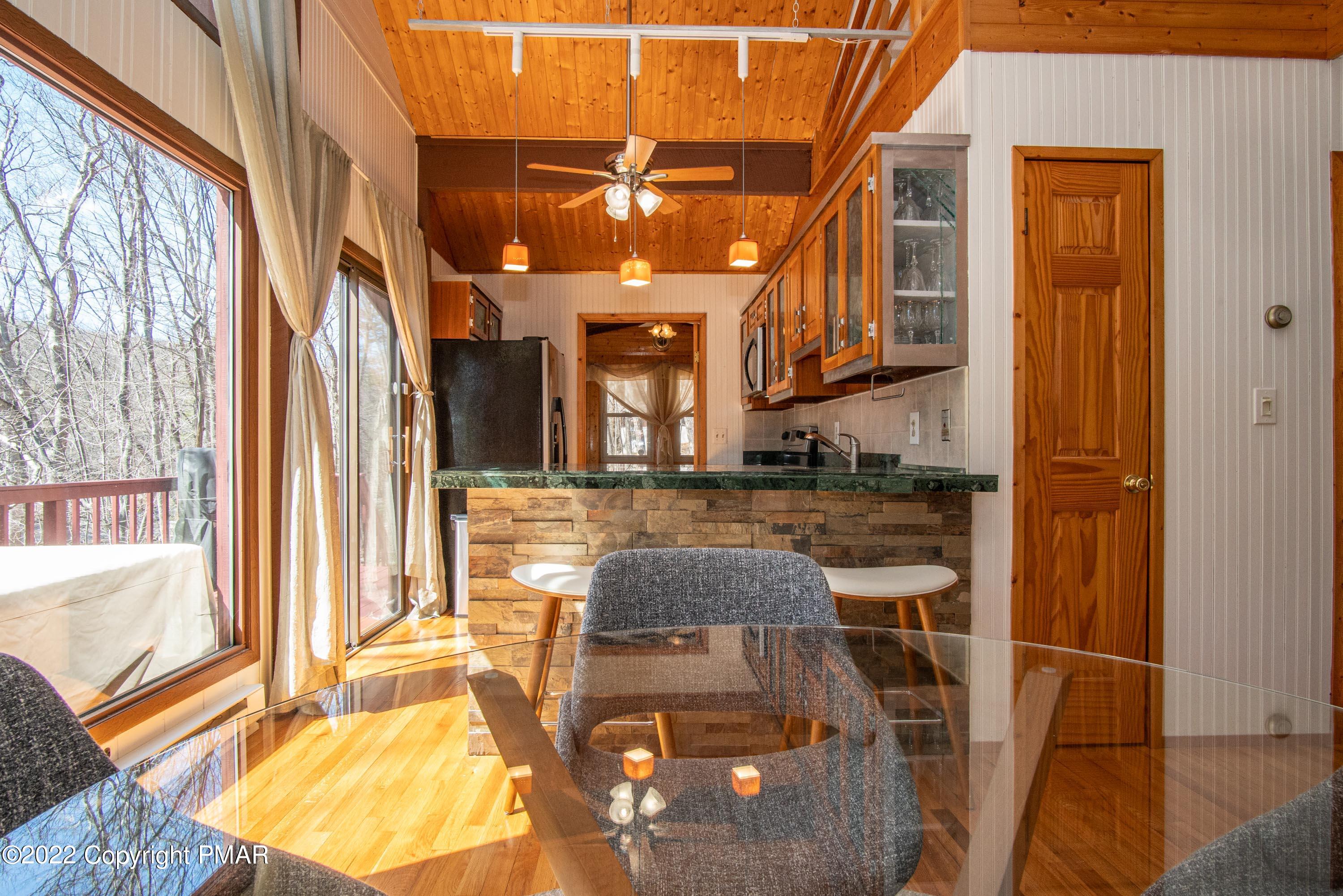 6374 Decker Road Bushkill, PA 18324 - Photo 8 of 60 a view of a living room with a large window