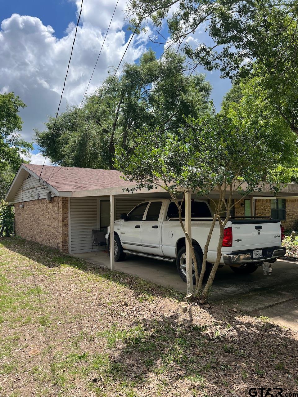 320 Bowers Street Lindale, TX 75771 - Photo 11 of 31 a view of a car garage