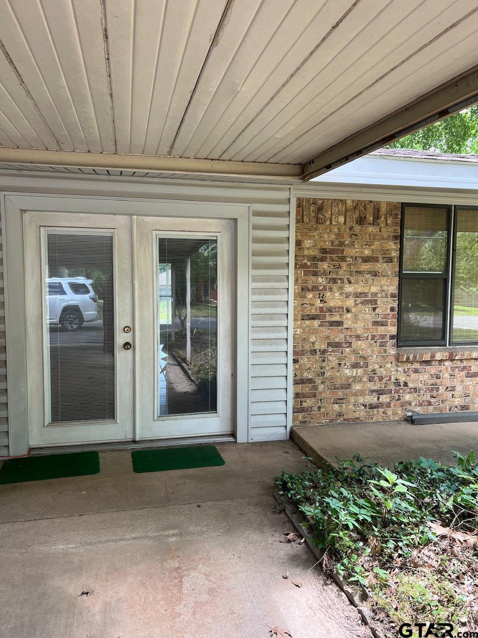 320 Bowers Street Lindale, TX 75771 - Photo 12 of 31 a front view of a house with a yard