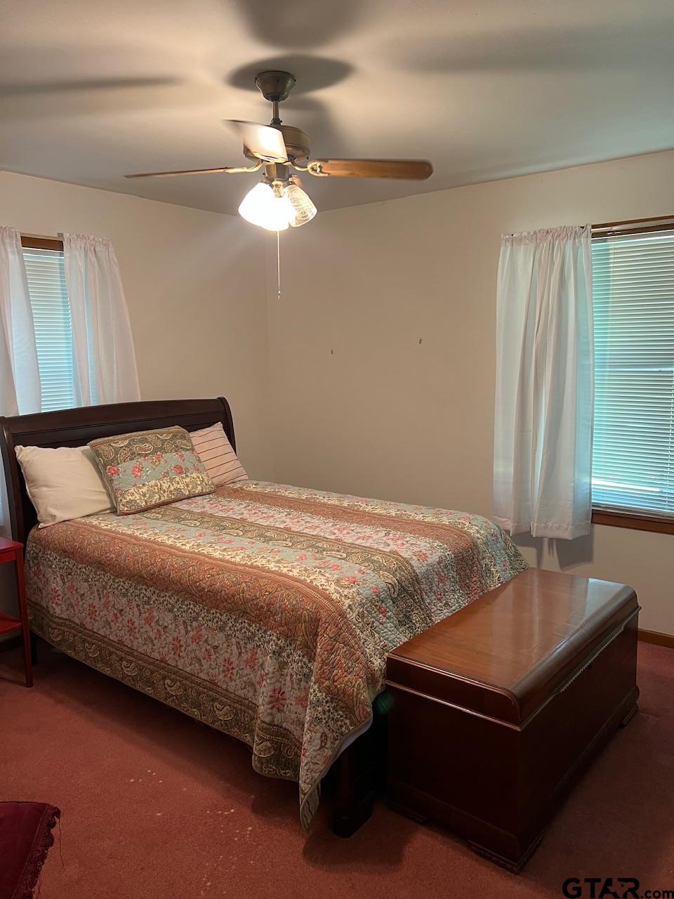 320 Bowers Street Lindale, TX 75771 - Photo 24 of 31 a bedroom with a bed and window