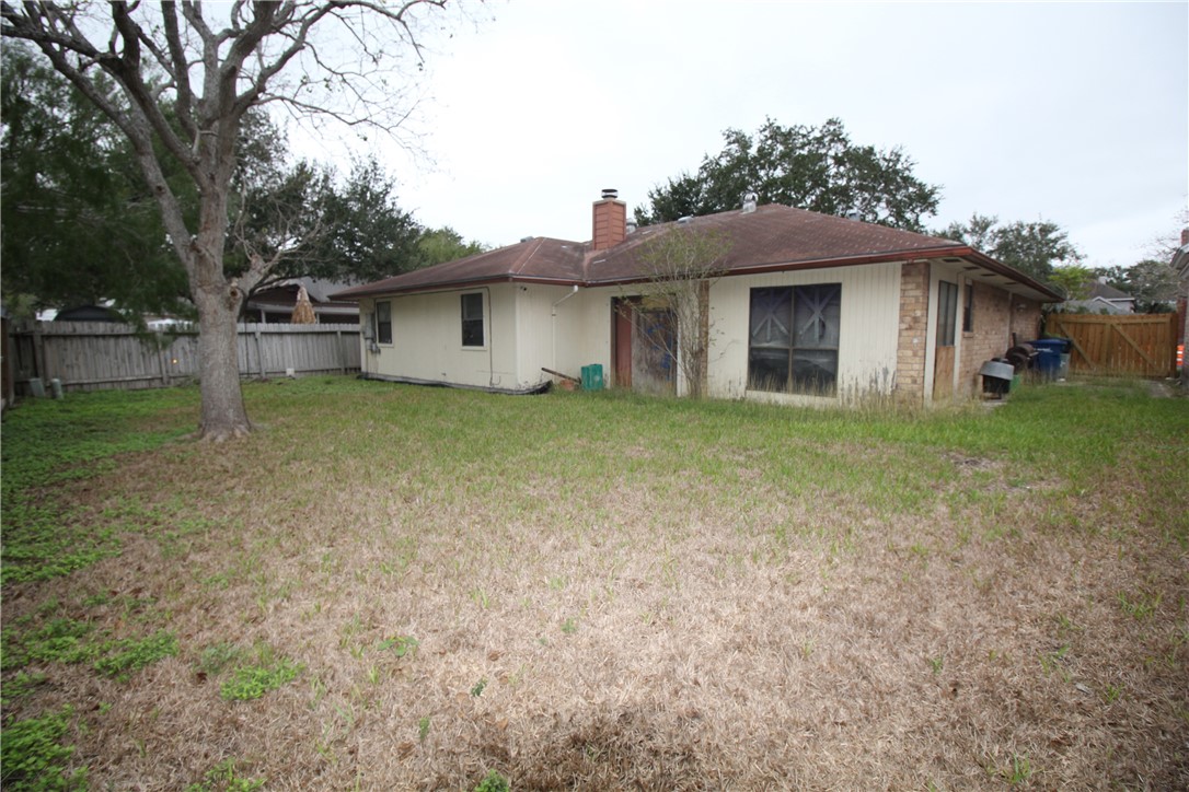 5409 Timbergate Drive Corpus Christi, TX 78413 - Photo 14 of 14 a front view of a house with a yard and garage