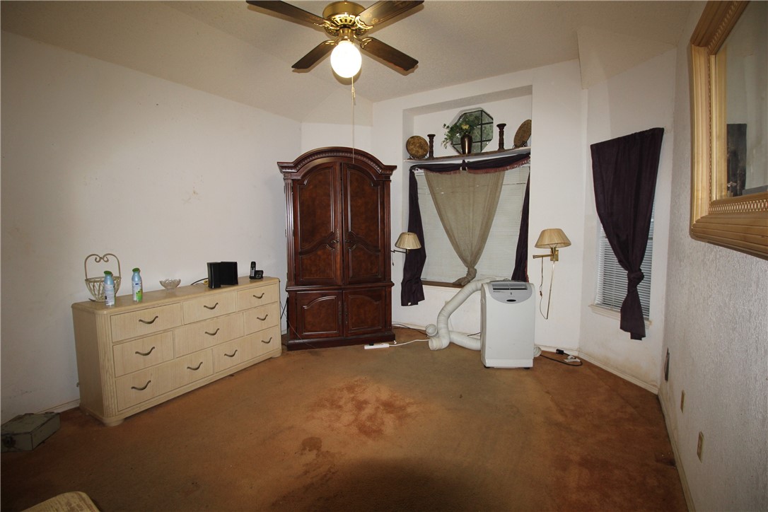 5409 Timbergate Drive Corpus Christi, TX 78413 - Photo 8 of 14 a view of room with workspace and windows