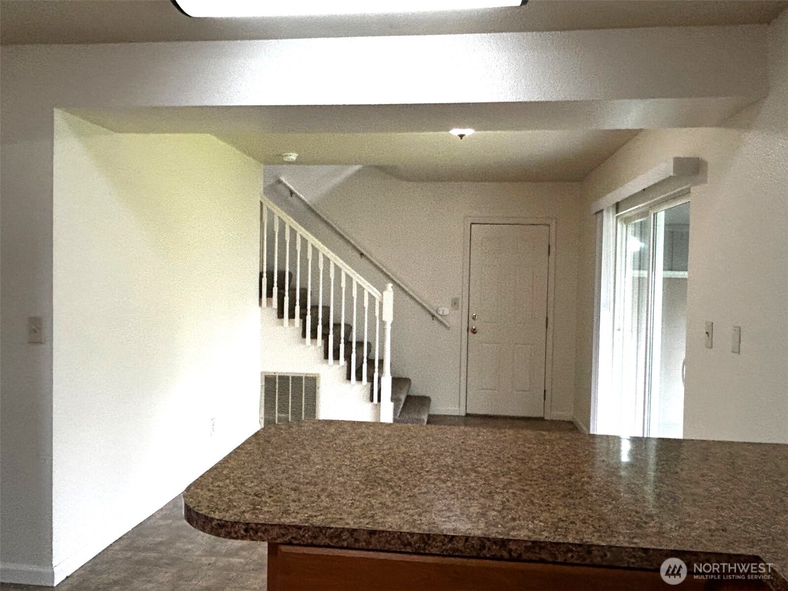 302 Crawford Street Kelso, WA 98626 - Photo 5 of 16 a view of entryway and hall with wooden floor