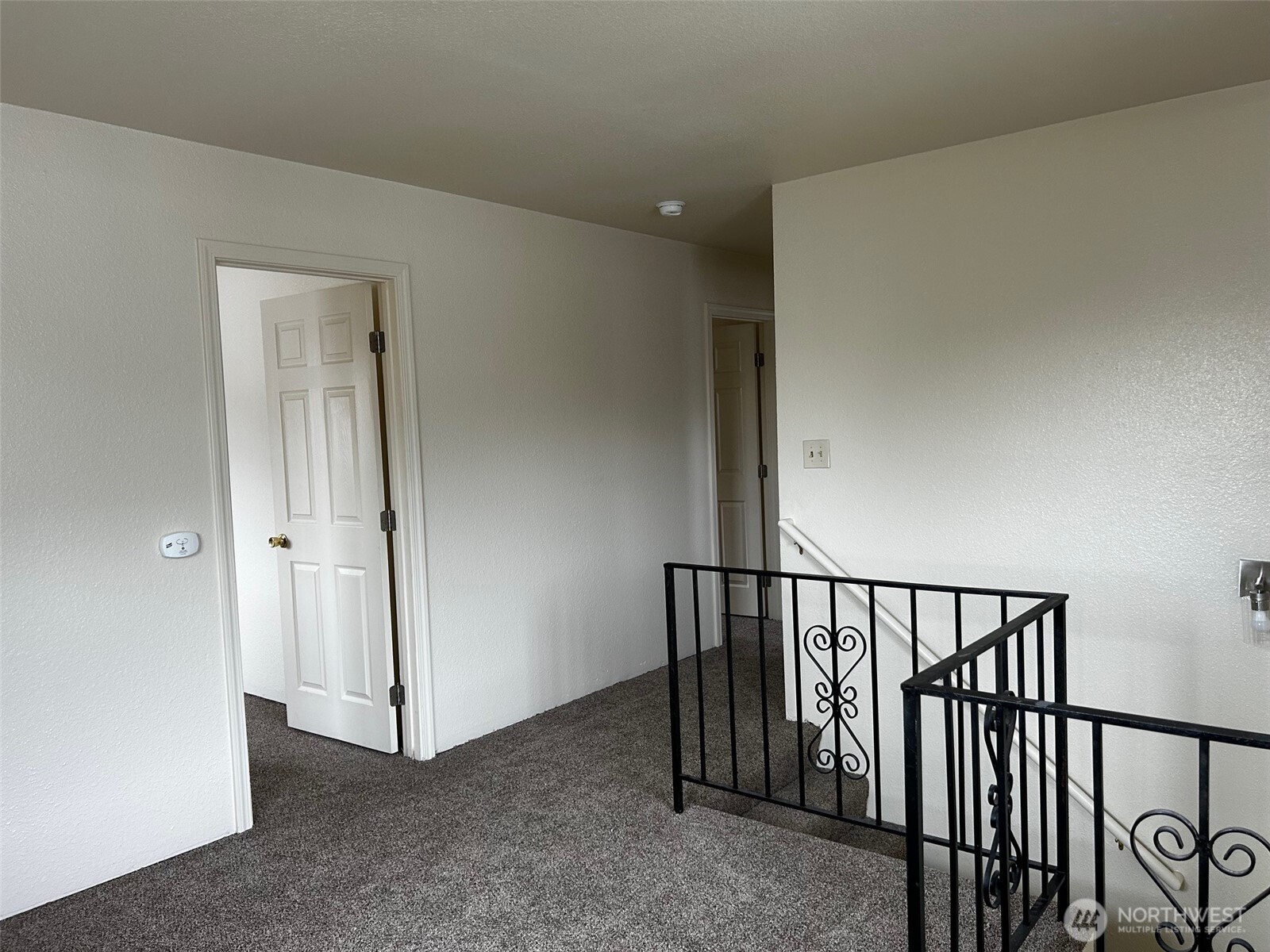 302 Crawford Street Kelso, WA 98626 - Photo 7 of 16 a view of a hallway with windows