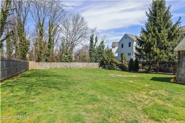 a view of a bathroom with a shower curtain