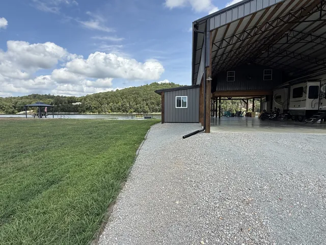 a front view of house with yard and seating area