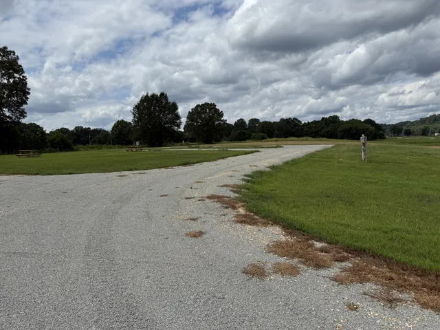 a view of a lake with houses in the background