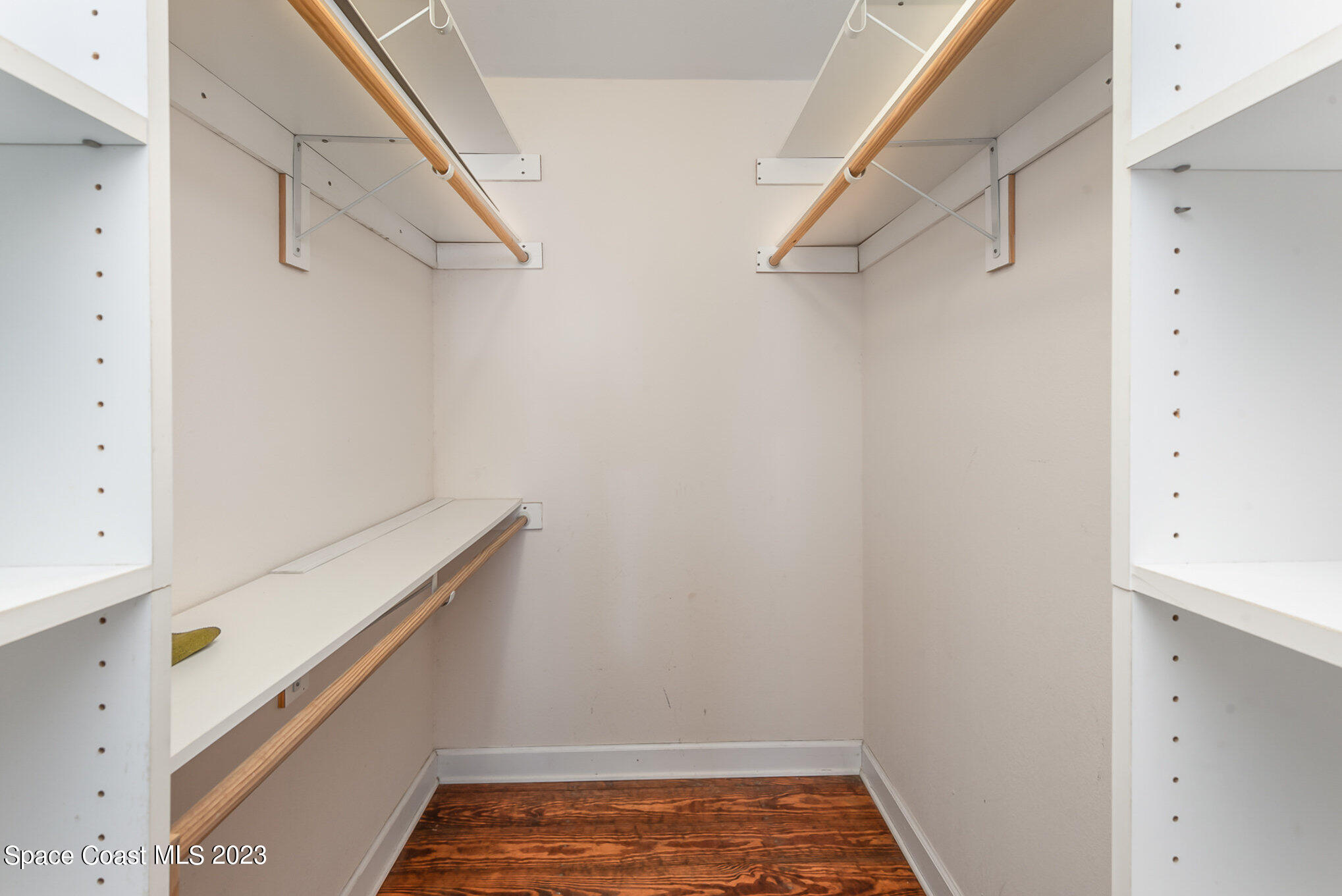 8219 Baxter Point Road Mims, FL 32754 - Photo 21 of 24 a view of storage and utility room with racks on the wall