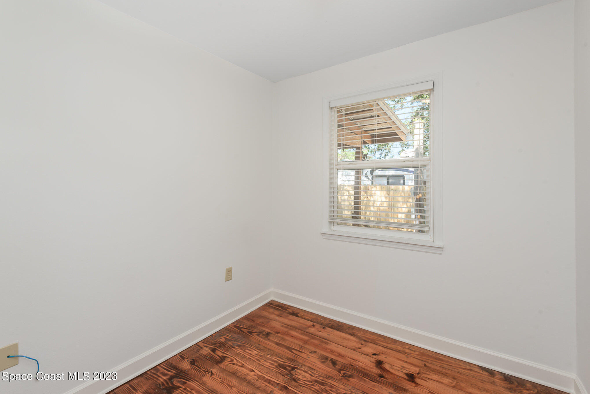 8219 Baxter Point Road Mims, FL 32754 - Photo 22 of 24 a view of a room that has a window in it