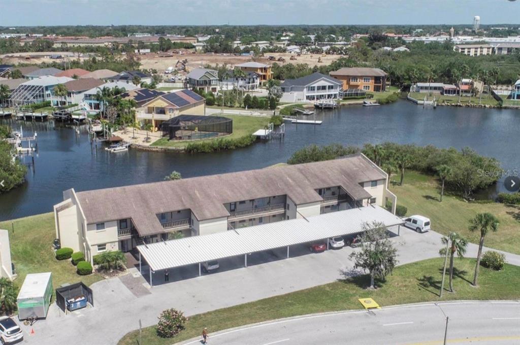 4609 Marine Parkway, Unit 102 New Port Richey, FL 34652 - Photo 2 of 2 an aerial view of a house with outdoor space
