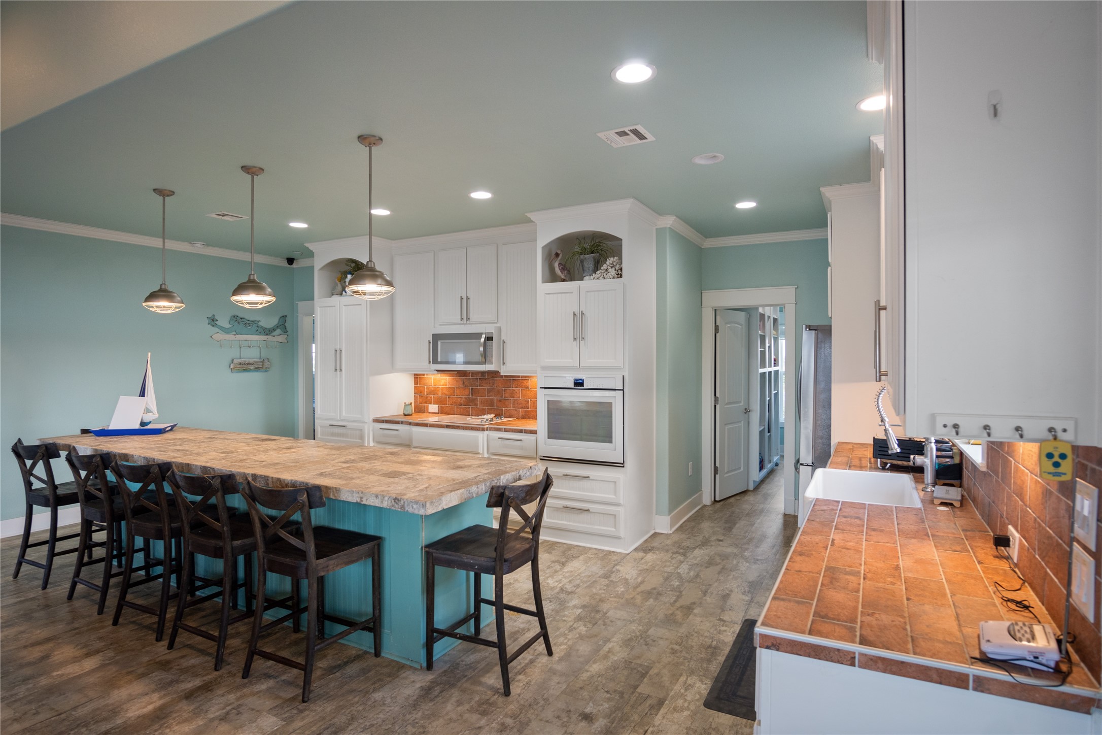 1682 Hamilton Avenue Port Bolivar, TX 77650 - Photo 12 of 38 a view of a dining room with furniture