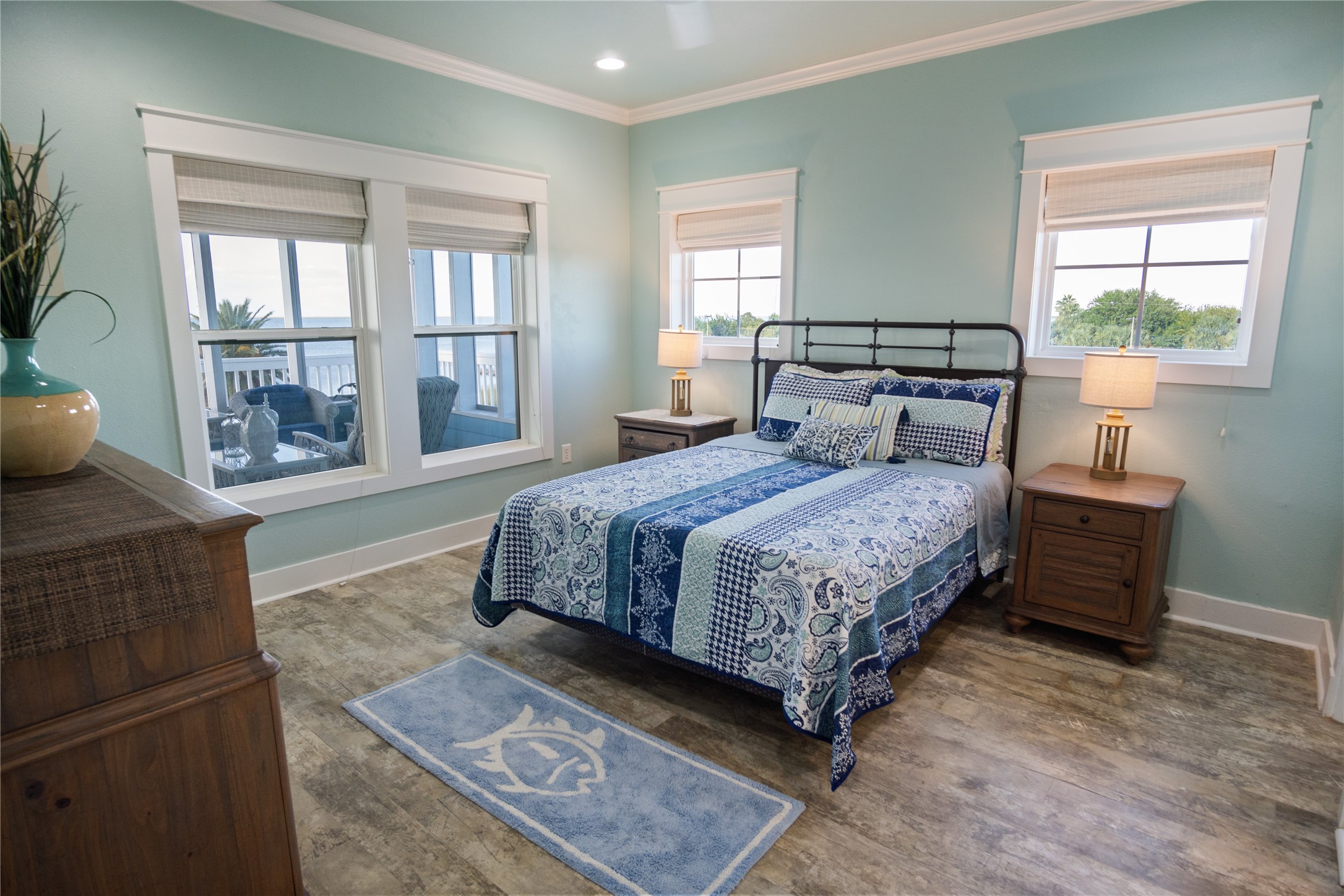 1682 Hamilton Avenue Port Bolivar, TX 77650 - Photo 18 of 38 a bedroom with a bed and window