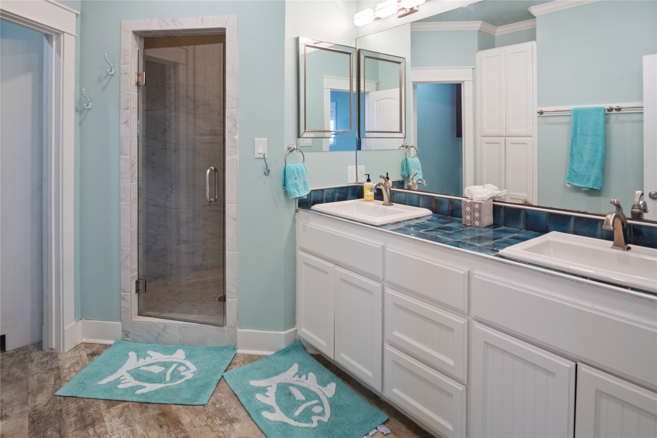 1682 Hamilton Avenue Port Bolivar, TX 77650 - Photo 19 of 38 a bathroom with a sink and a mirror