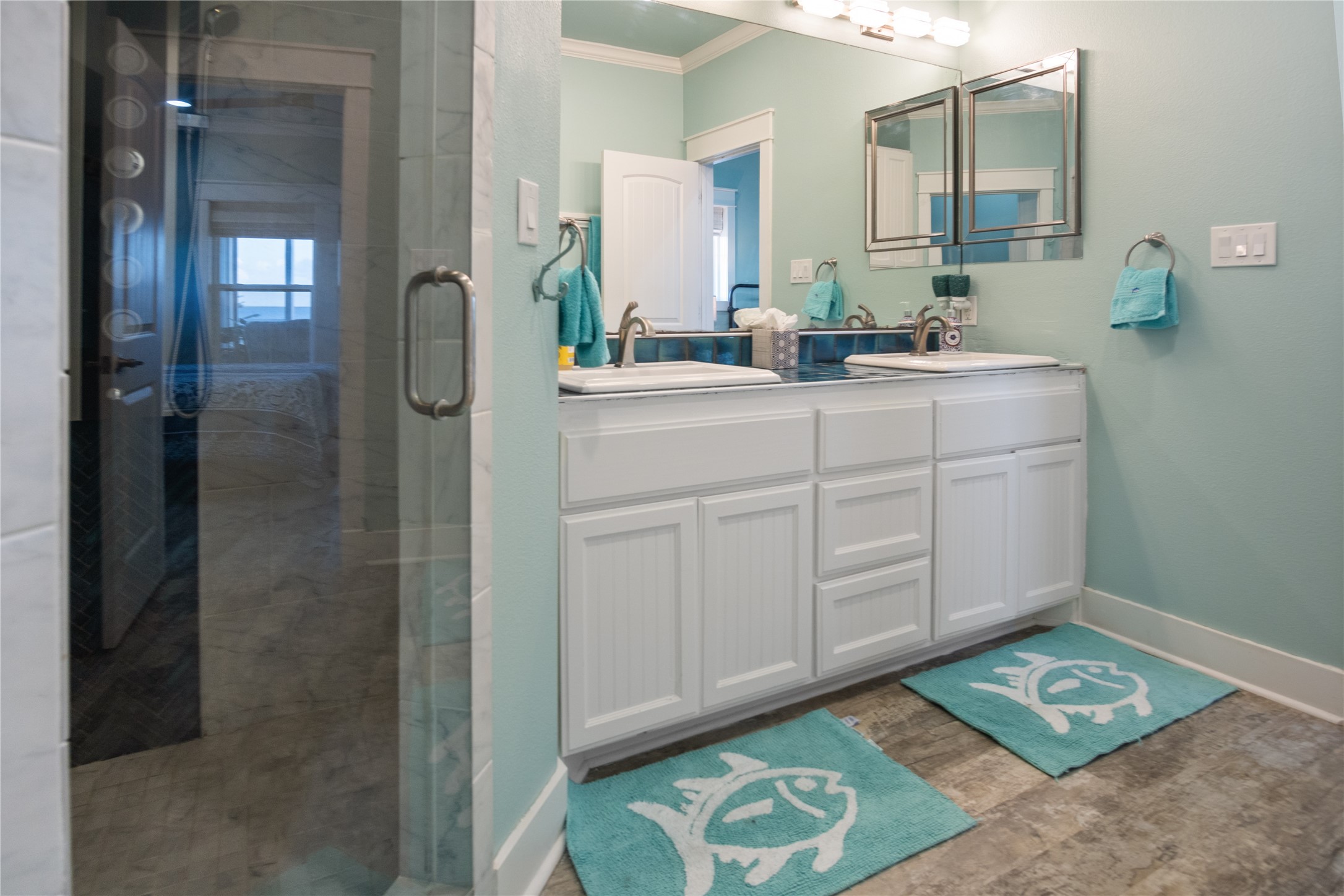 1682 Hamilton Avenue Port Bolivar, TX 77650 - Photo 21 of 38 a bathroom with a sink and a mirror