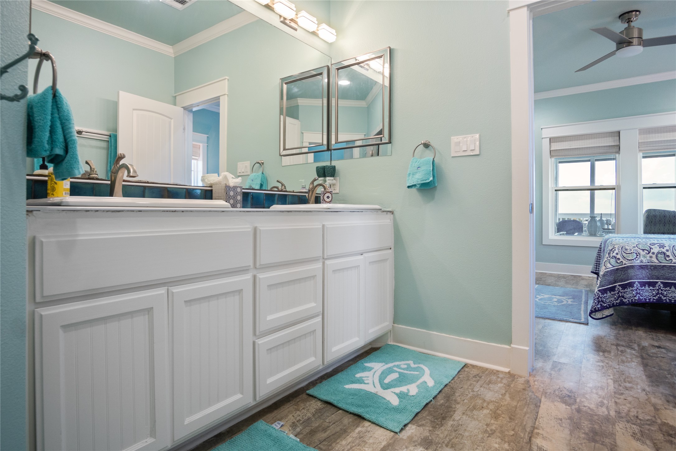 1682 Hamilton Avenue Port Bolivar, TX 77650 - Photo 22 of 38 a bathroom with a sink and a mirror