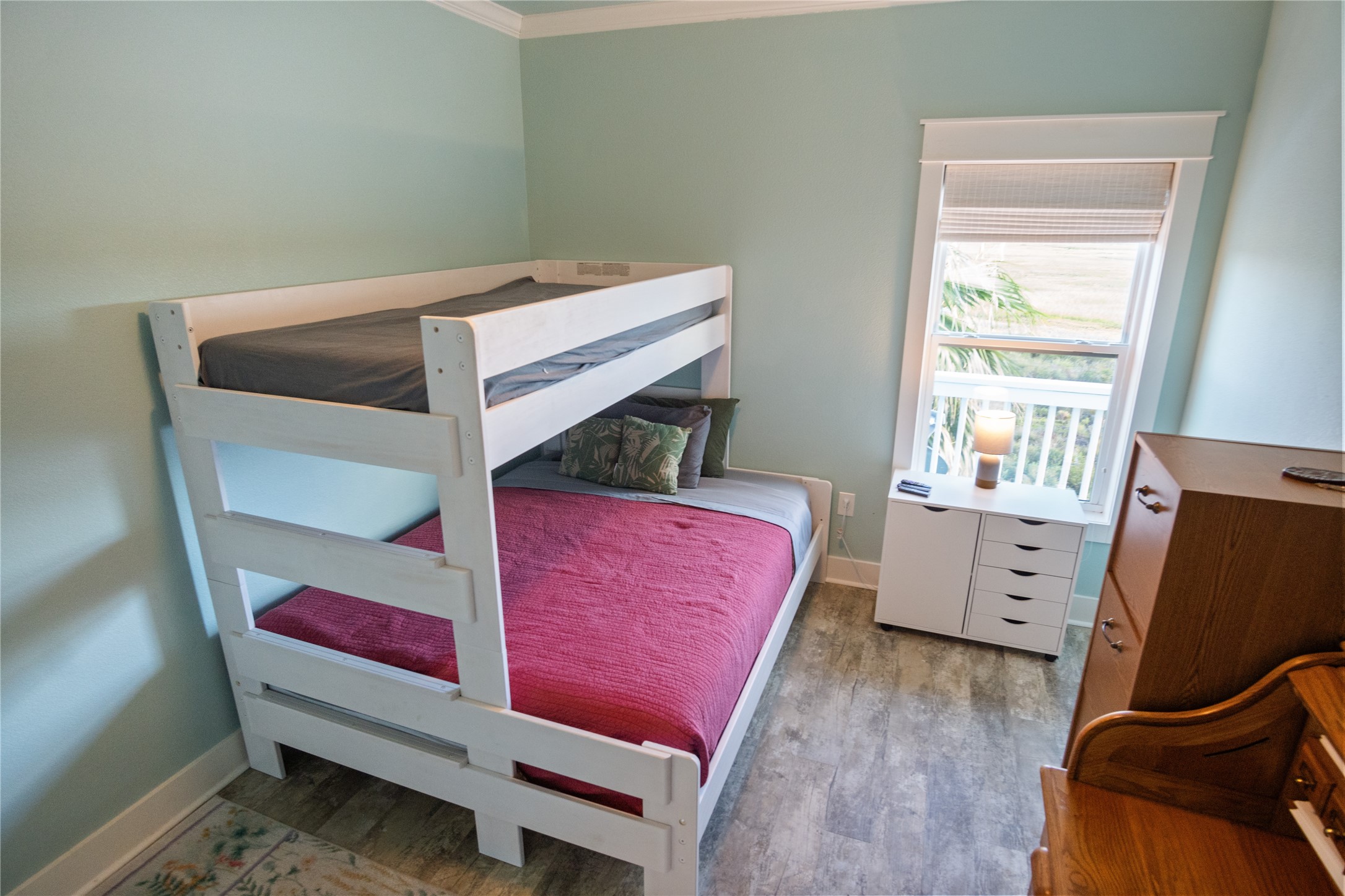 1682 Hamilton Avenue Port Bolivar, TX 77650 - Photo 23 of 38 a view of bedroom with furniture and a window