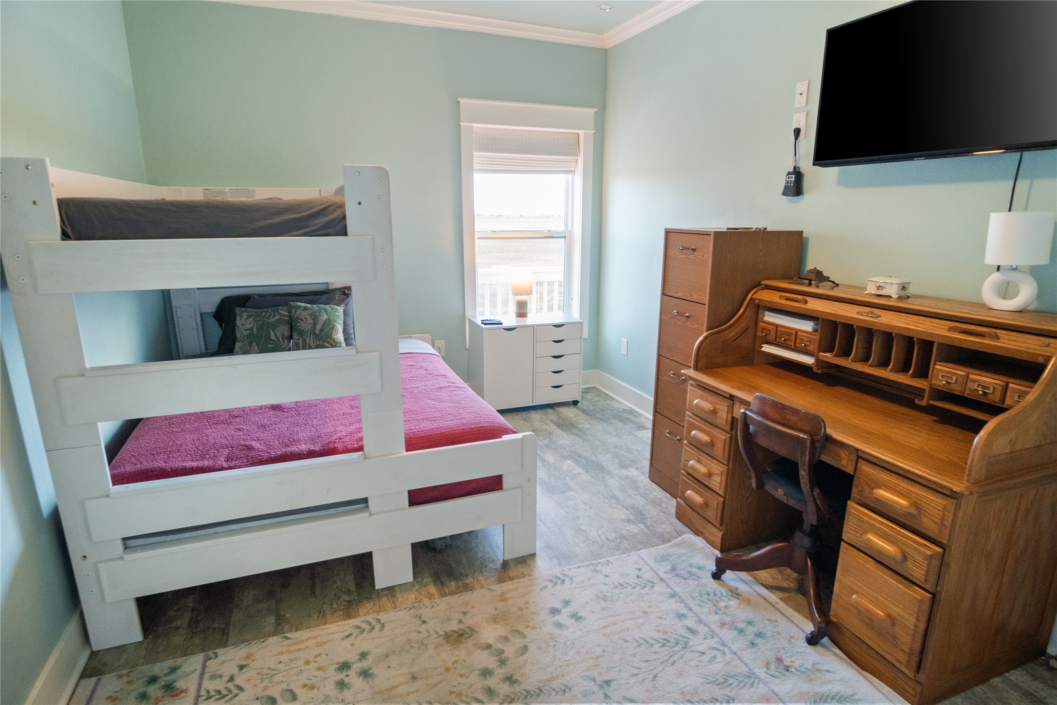 1682 Hamilton Avenue Port Bolivar, TX 77650 - Photo 24 of 38 a living room with furniture and a flat screen tv
