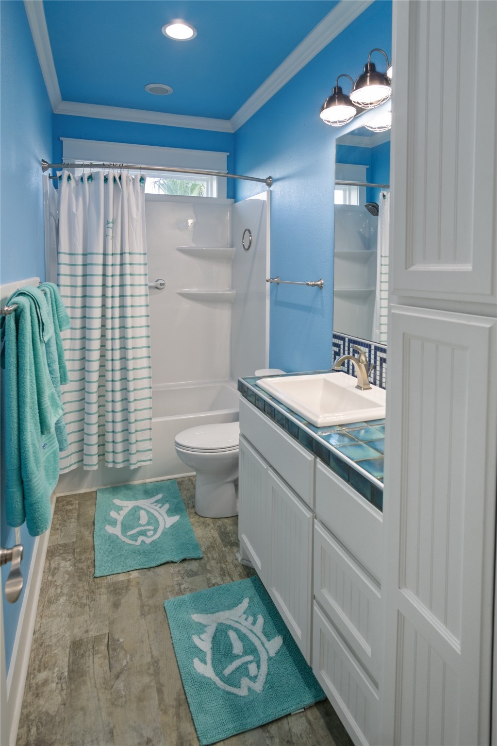 1682 Hamilton Avenue Port Bolivar, TX 77650 - Photo 25 of 38 a bathroom with a sink toilet and shower