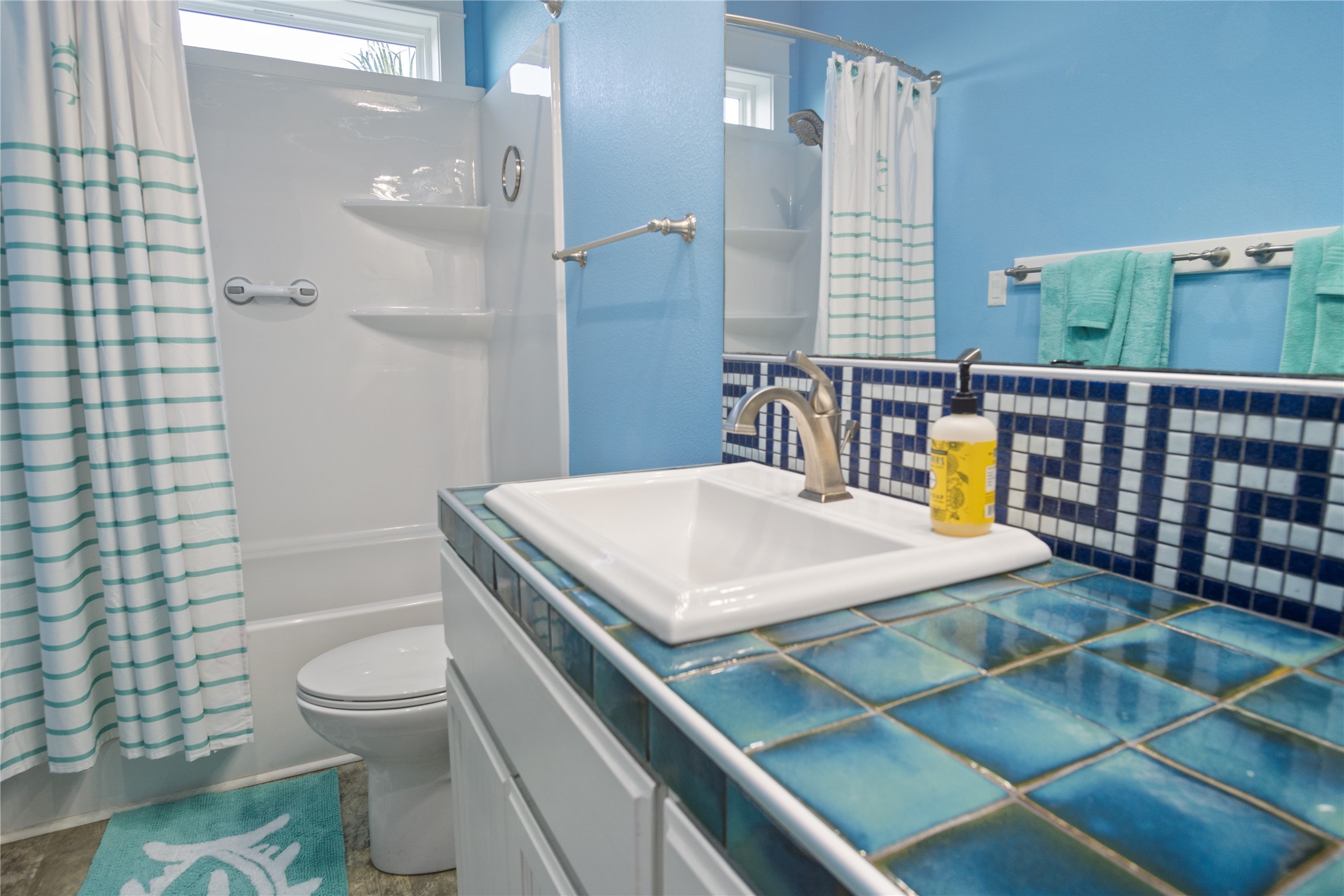 1682 Hamilton Avenue Port Bolivar, TX 77650 - Photo 26 of 38 a bathroom with a sink a toilet and shower