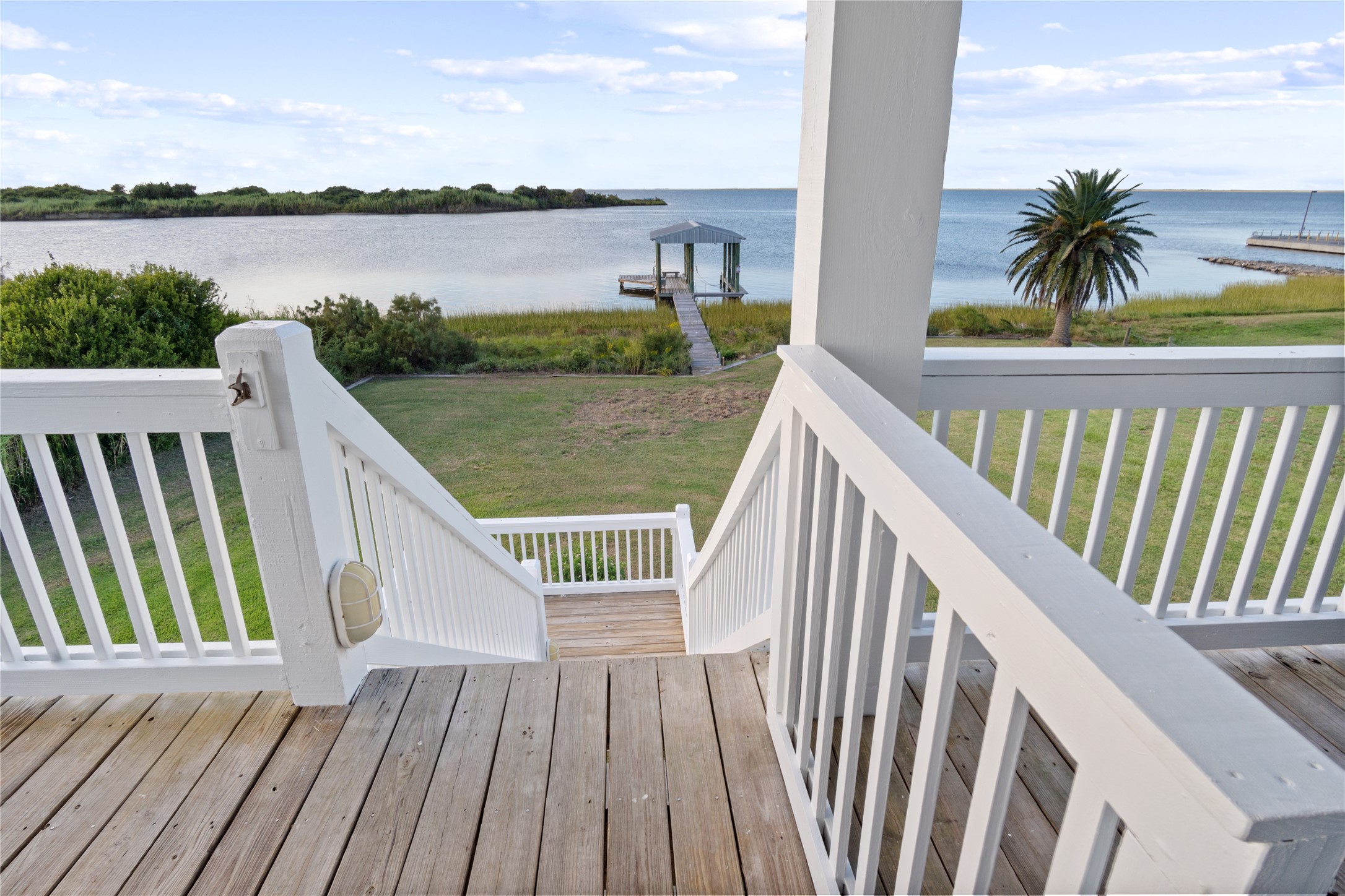 1682 Hamilton Avenue Port Bolivar, TX 77650 - Photo 37 of 38 a view of balcony with furniture and wooden floor