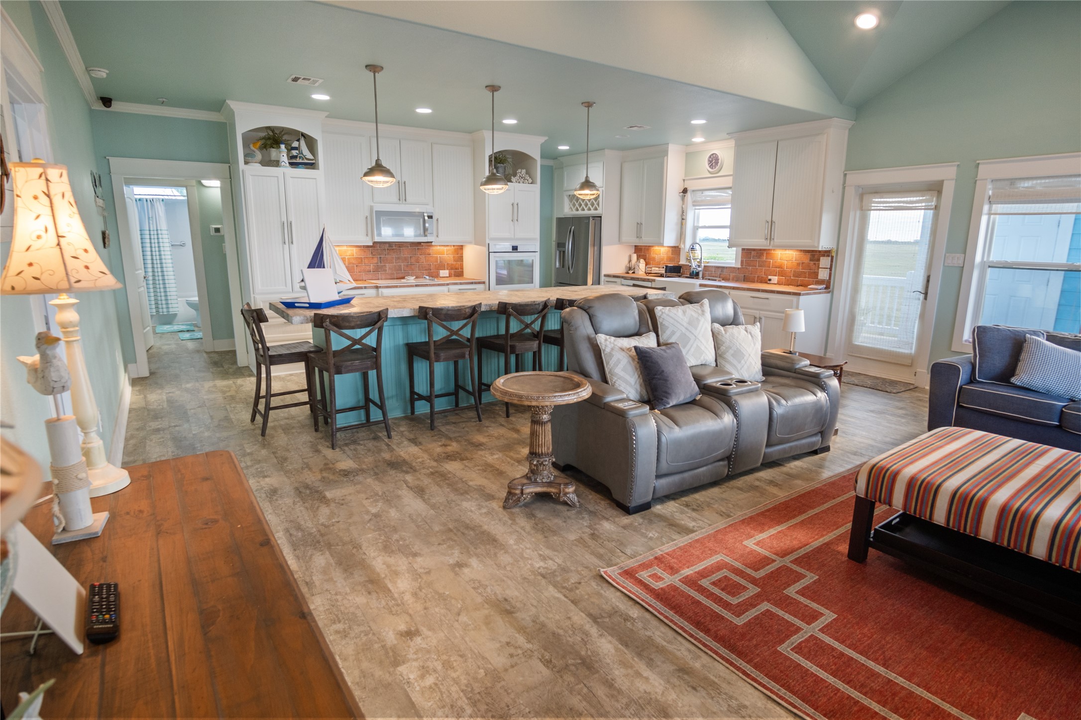 1682 Hamilton Avenue Port Bolivar, TX 77650 - Photo 6 of 38 a living room with furniture and a large window