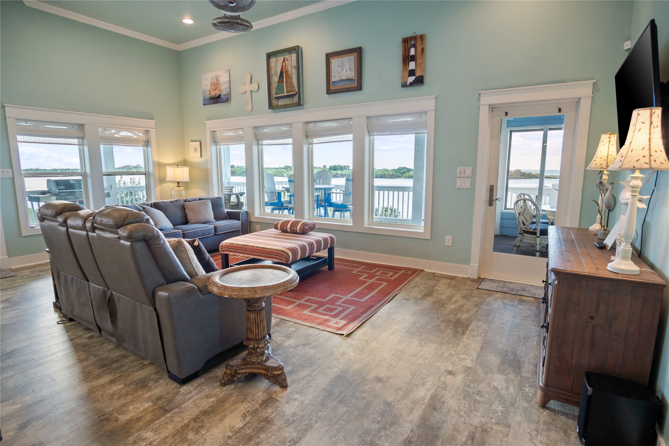 1682 Hamilton Avenue Port Bolivar, TX 77650 - Photo 8 of 38 a living room with furniture and a flat screen tv