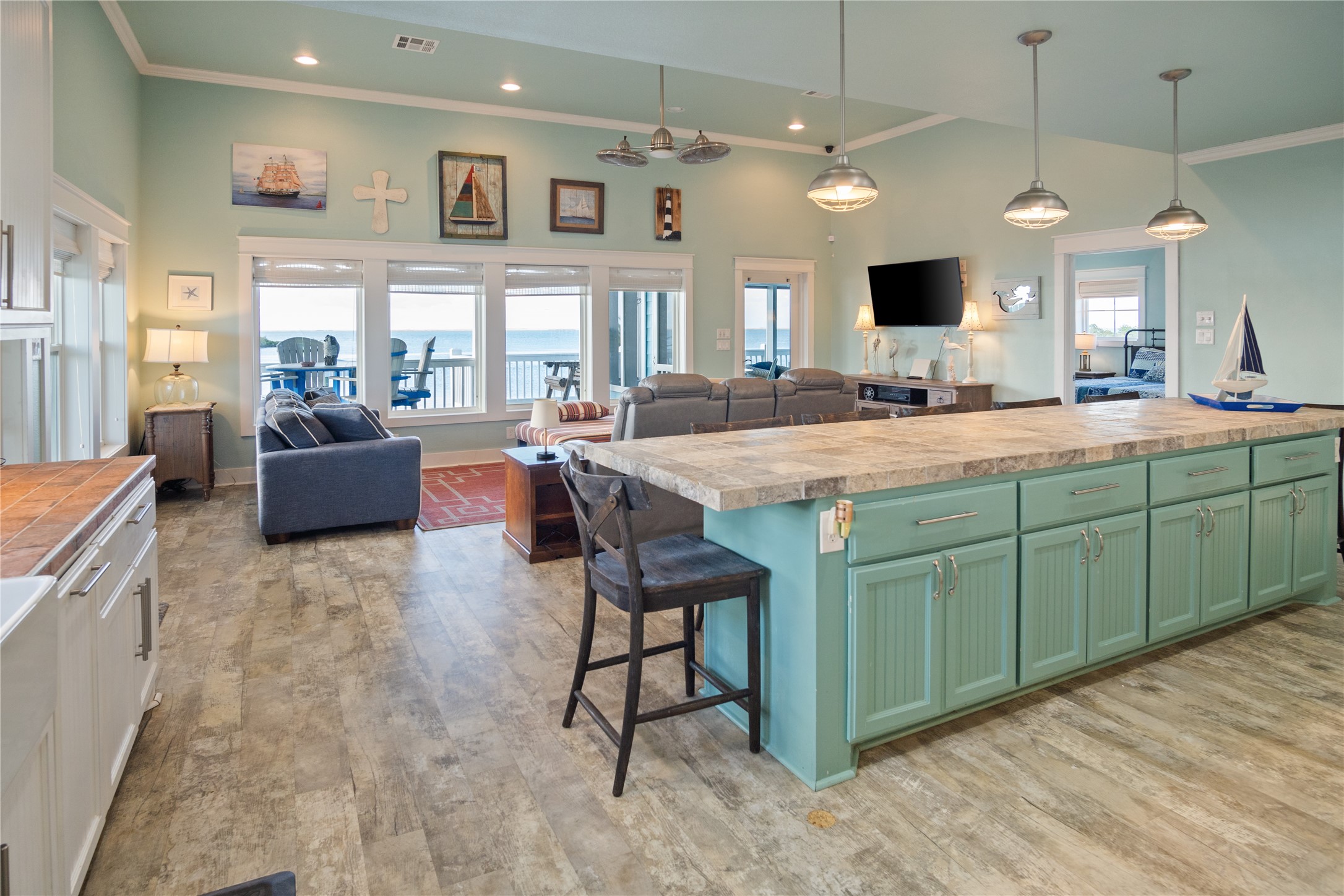 1682 Hamilton Avenue Port Bolivar, TX 77650 - Photo 10 of 38 a large kitchen with kitchen island a large island in the center