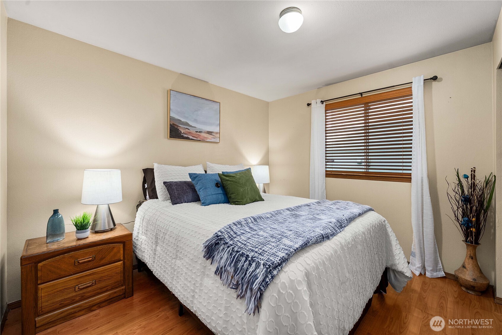 5103 South Garden Loop Road, Unit 25 Seattle, WA 98118 - Photo 14 of 23 a bedroom with bed and a window