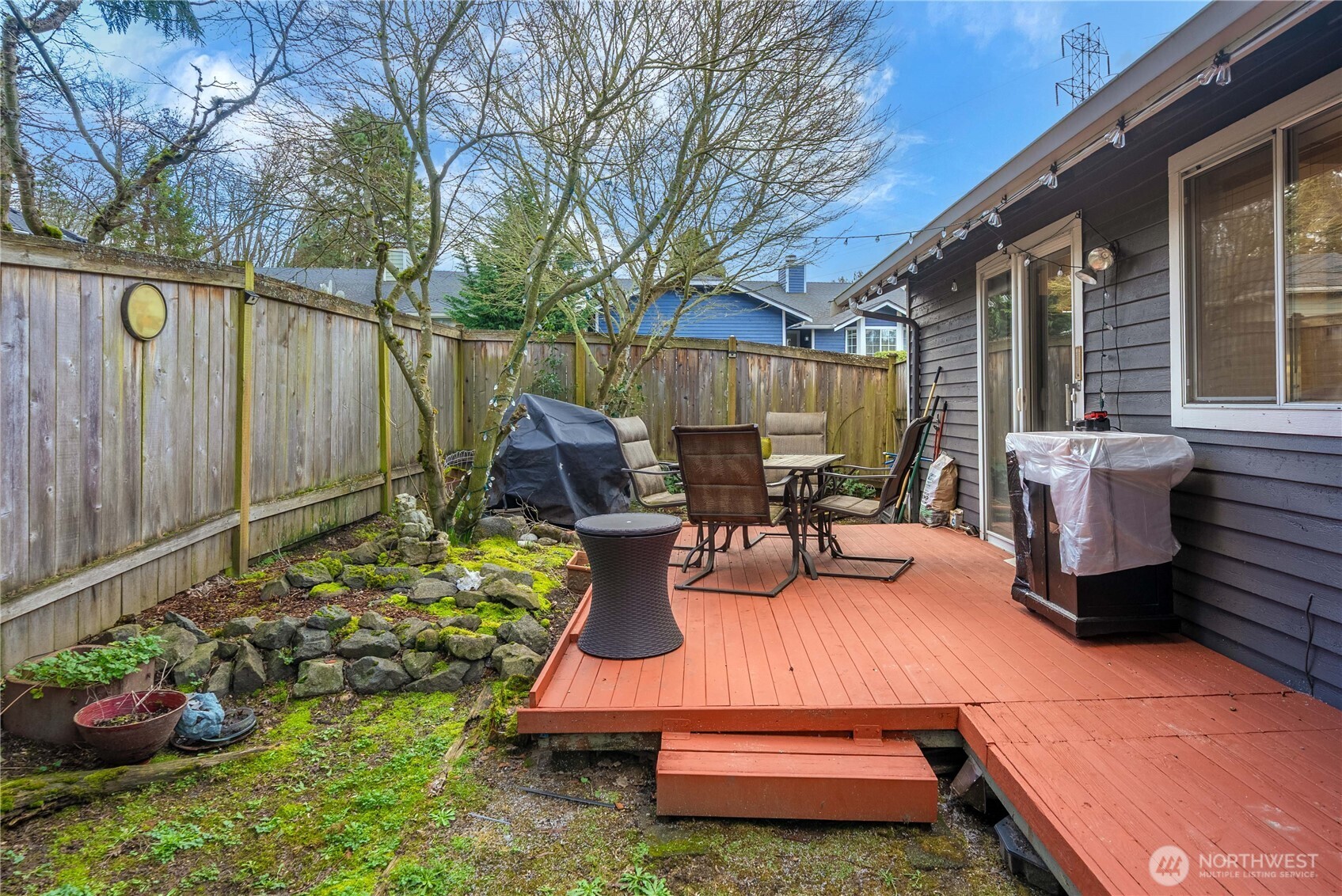 5103 South Garden Loop Road, Unit 25 Seattle, WA 98118 - Photo 18 of 23 a outdoor view with a sitting space