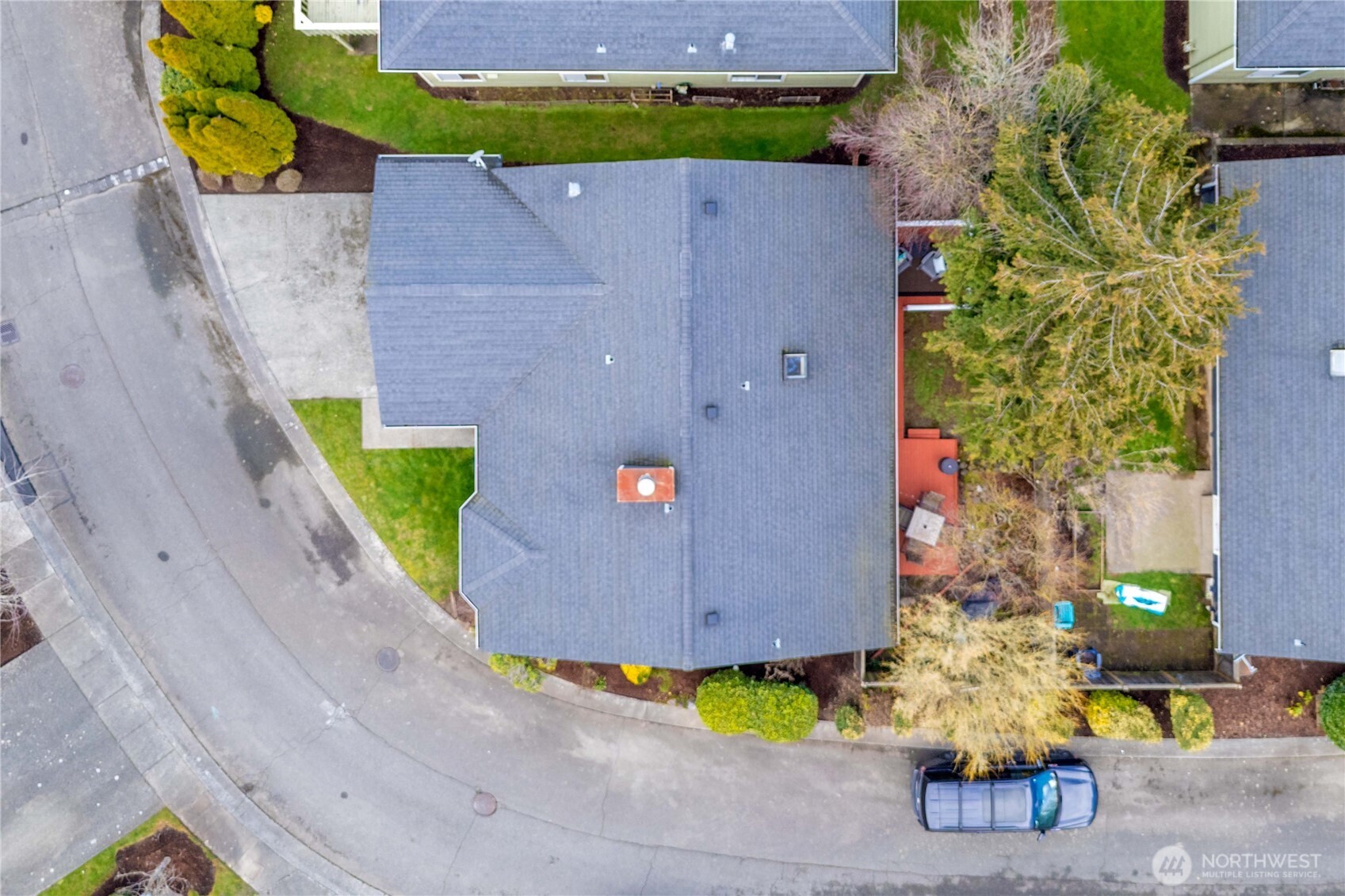 5103 South Garden Loop Road, Unit 25 Seattle, WA 98118 - Photo 19 of 23 an aerial view of a house with a swimming pool