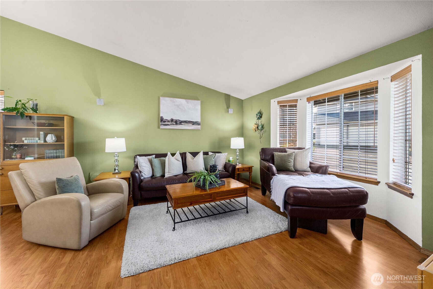 5103 South Garden Loop Road, Unit 25 Seattle, WA 98118 - Photo 3 of 23 a living room with furniture and a large window