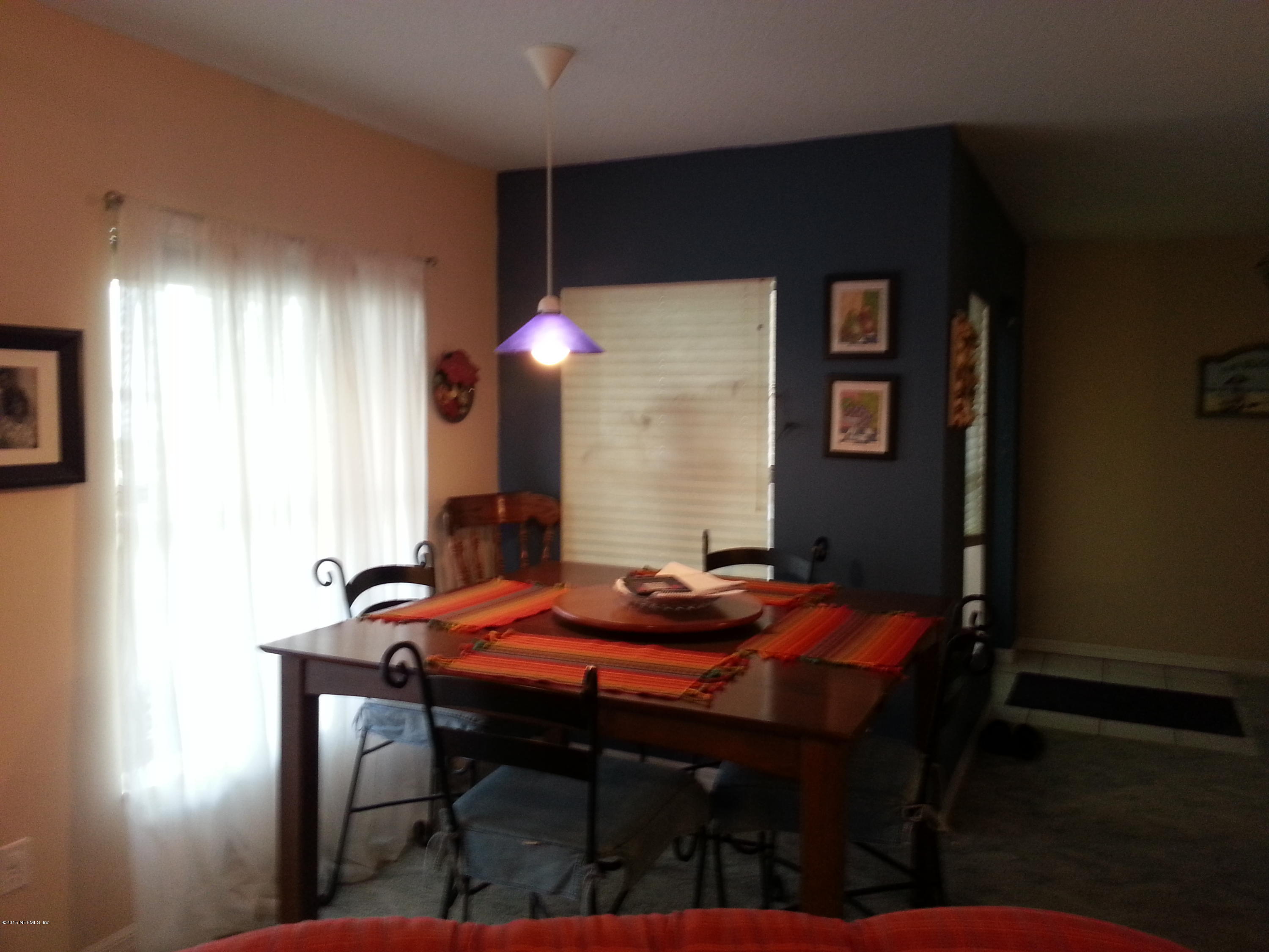 308 Outrigger Way Vilano Beach, FL 32084 - Photo 12 of 33 a dining room with furniture and window