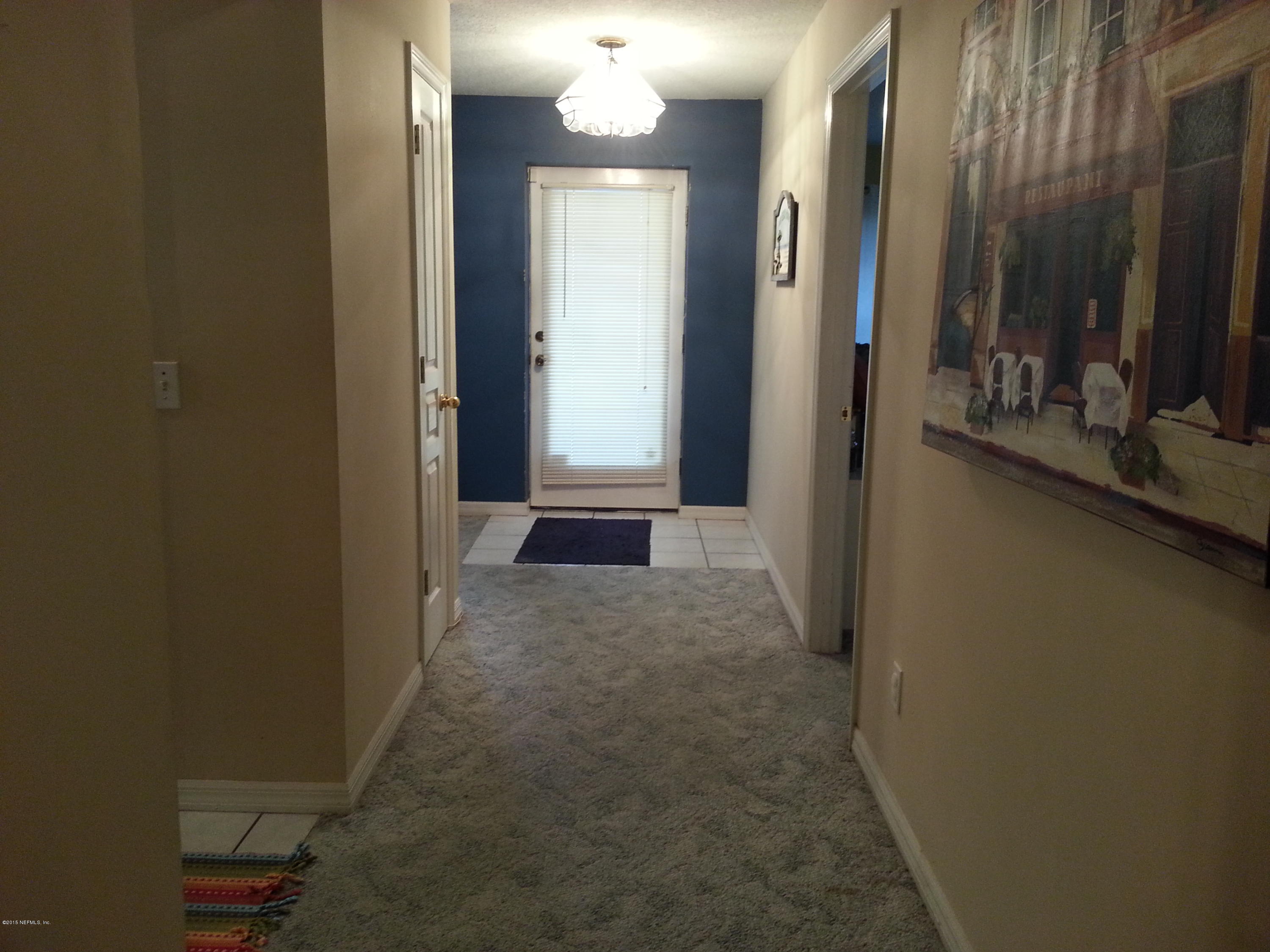 308 Outrigger Way Vilano Beach, FL 32084 - Photo 16 of 33 a view of gallery with mirror