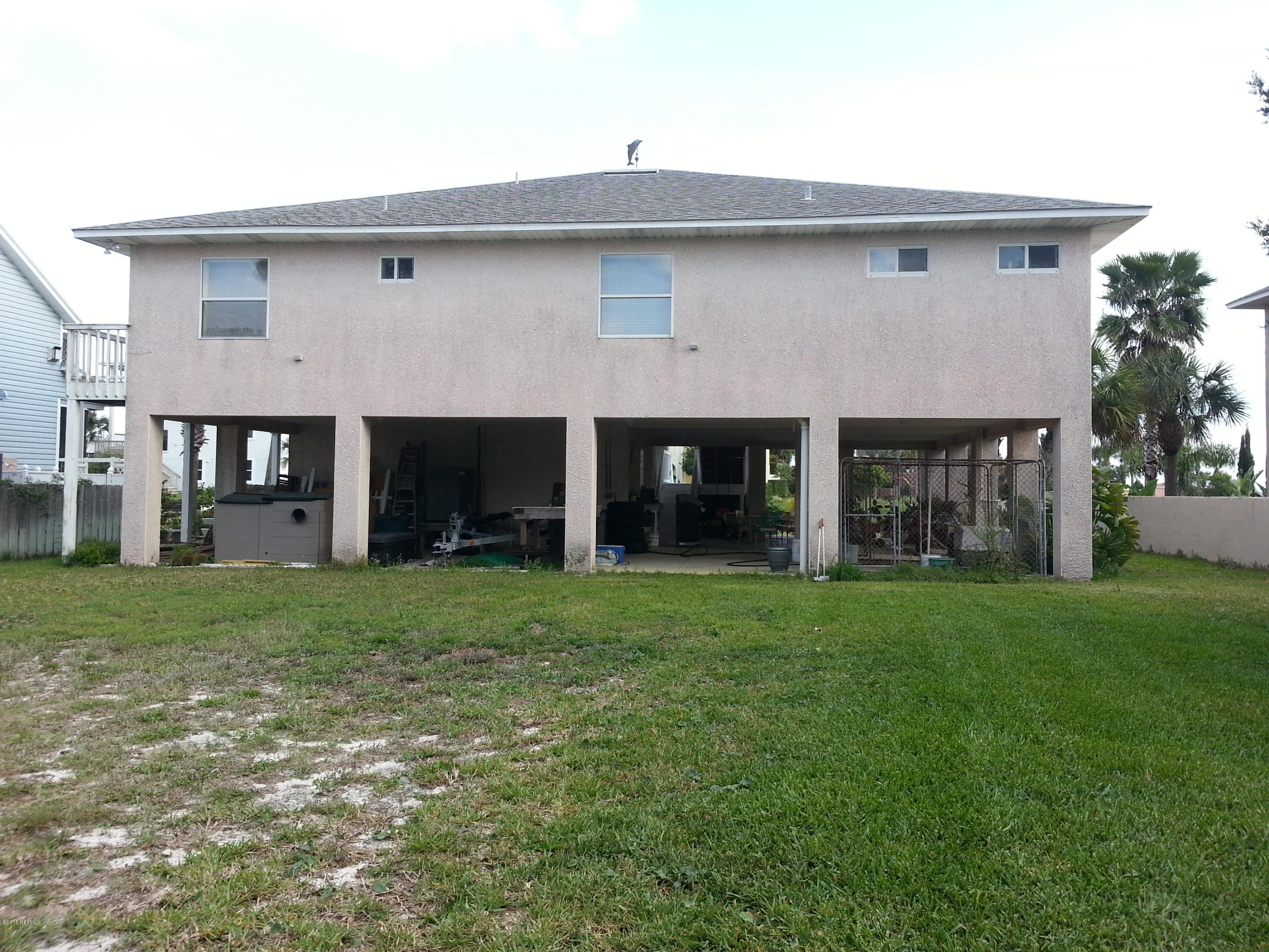 308 Outrigger Way Vilano Beach, FL 32084 - Photo 5 of 33 a view of a yard in front of a house