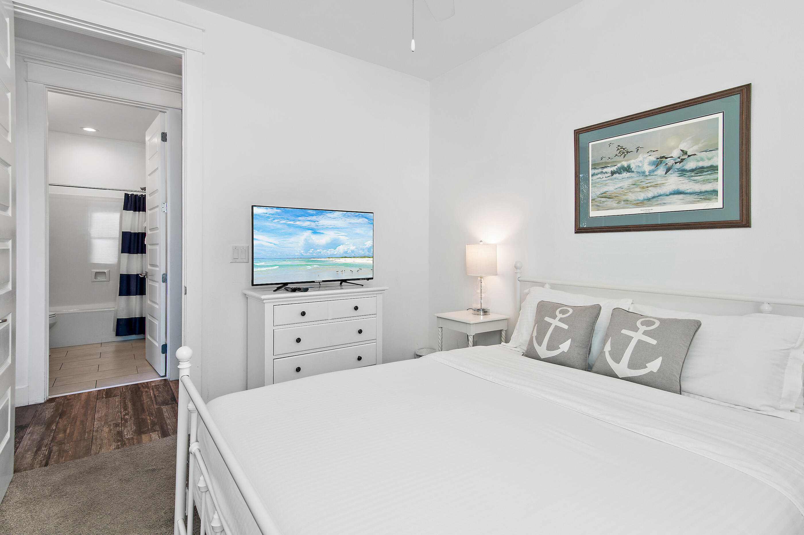 33 Sugar Sand Lane Santa Rosa Beach, FL 32459 - Photo 11 of 35 a bedroom with a bed and a flat screen tv