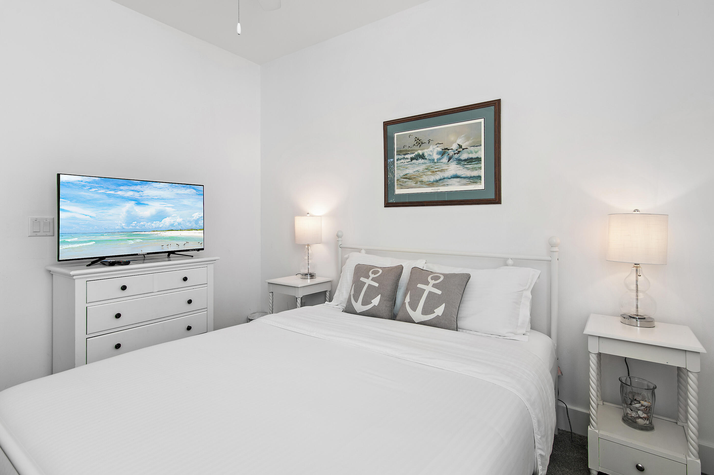 33 Sugar Sand Lane Santa Rosa Beach, FL 32459 - Photo 12 of 35 a bedroom with a bed and a flat screen tv