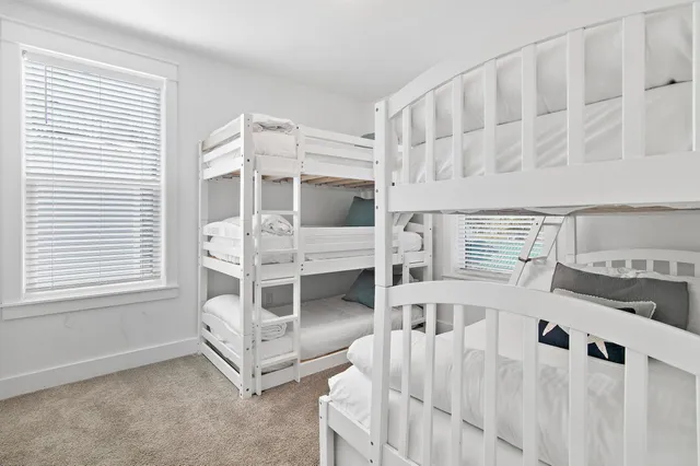 a view of a living room and entry way