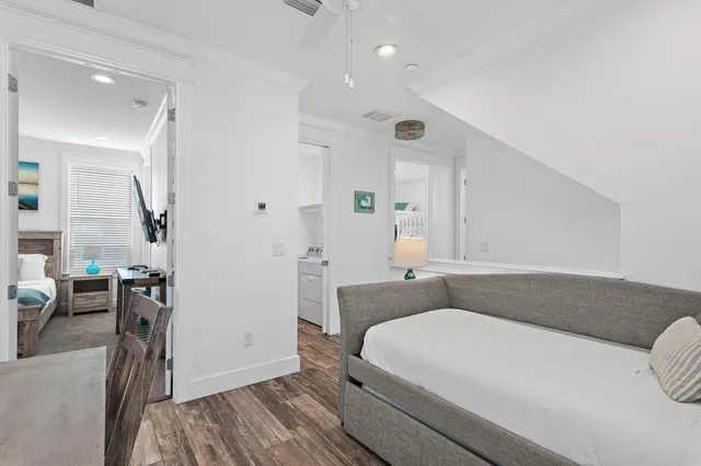 a bedroom with a bed and a table